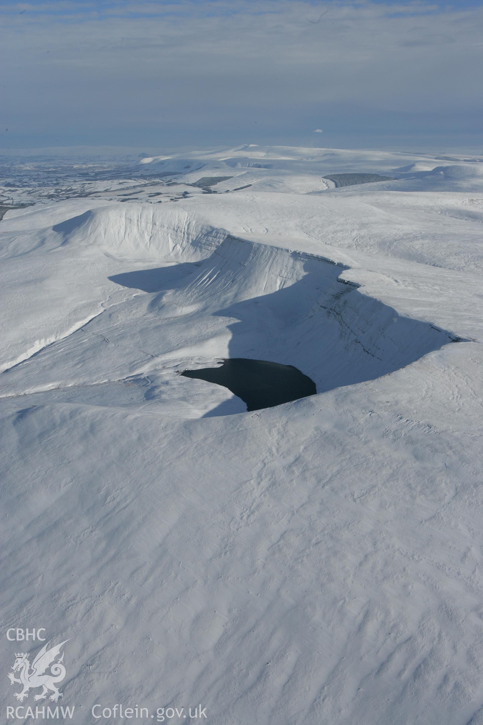 RCAHMW colour oblique photograph of Llyn y Fan Fach, winter landscape. Taken by Toby Driver on 06/02/2009.