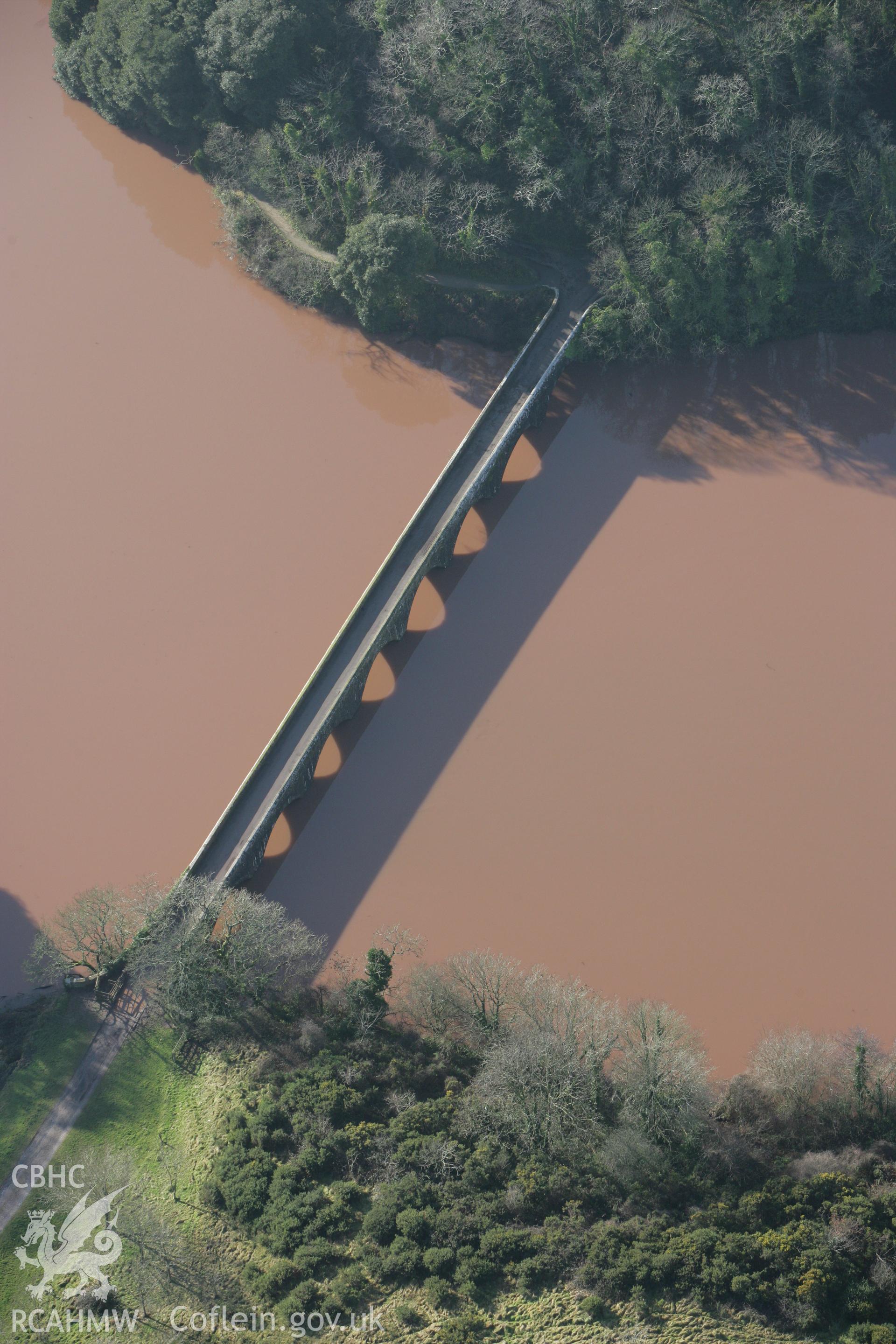 RCAHMW colour oblique aerial photograph of the eight arched Bridge at Stackpole Court. Taken on 28 January 2009 by Toby Driver