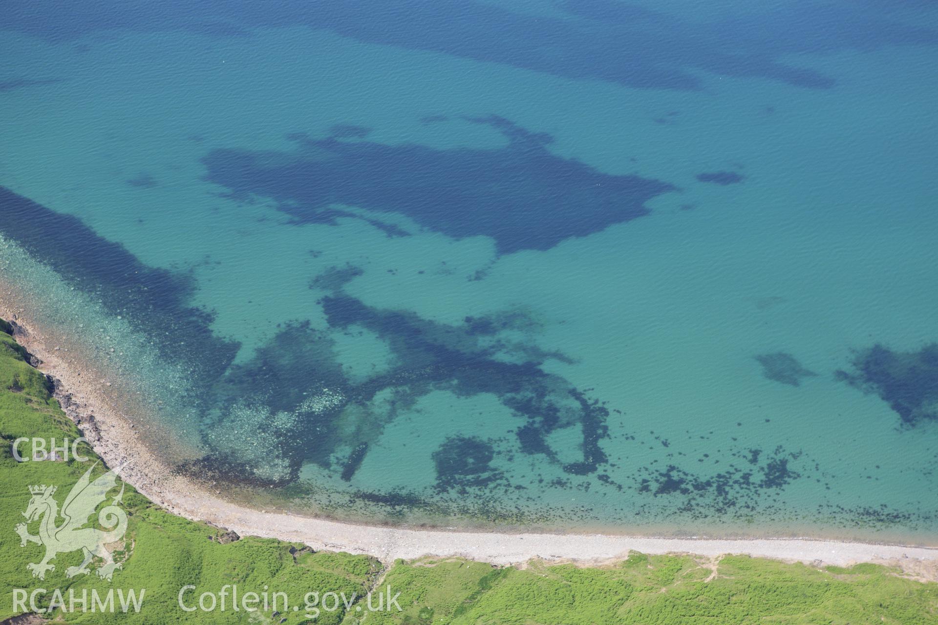 RCAHMW colour oblique aerial photograph of Boulder Bank Fish Trap. Taken on 16 June 2009 by Toby Driver