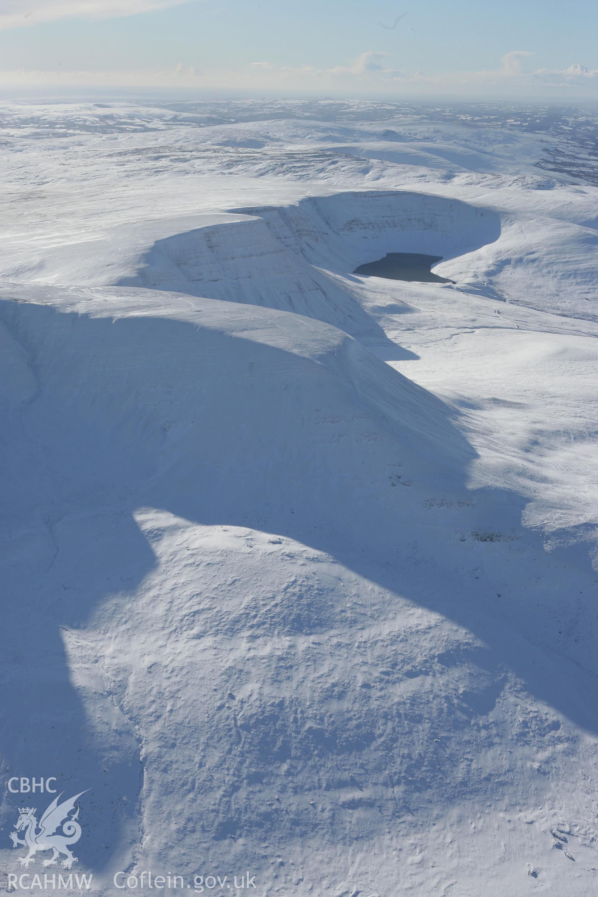 RCAHMW colour oblique photograph of Llyn y Fan Fach, winter landscape. Taken by Toby Driver on 06/02/2009.