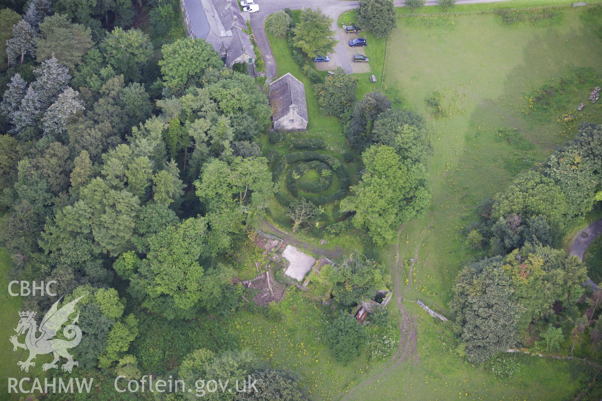 RCAHMW colour oblique aerial photograph of Chapel of Holy Trinity, Llanrychwyn. Taken on 06 August 2009 by Toby Driver