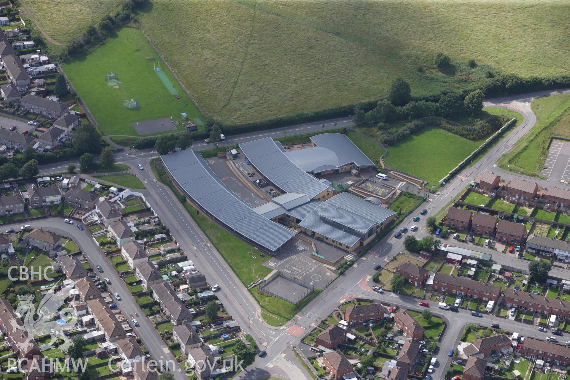 RCAHMW colour oblique aerial photograph of Deri View Primary School and Acorn Centre. Taken on 23 July 2009 by Toby Driver
