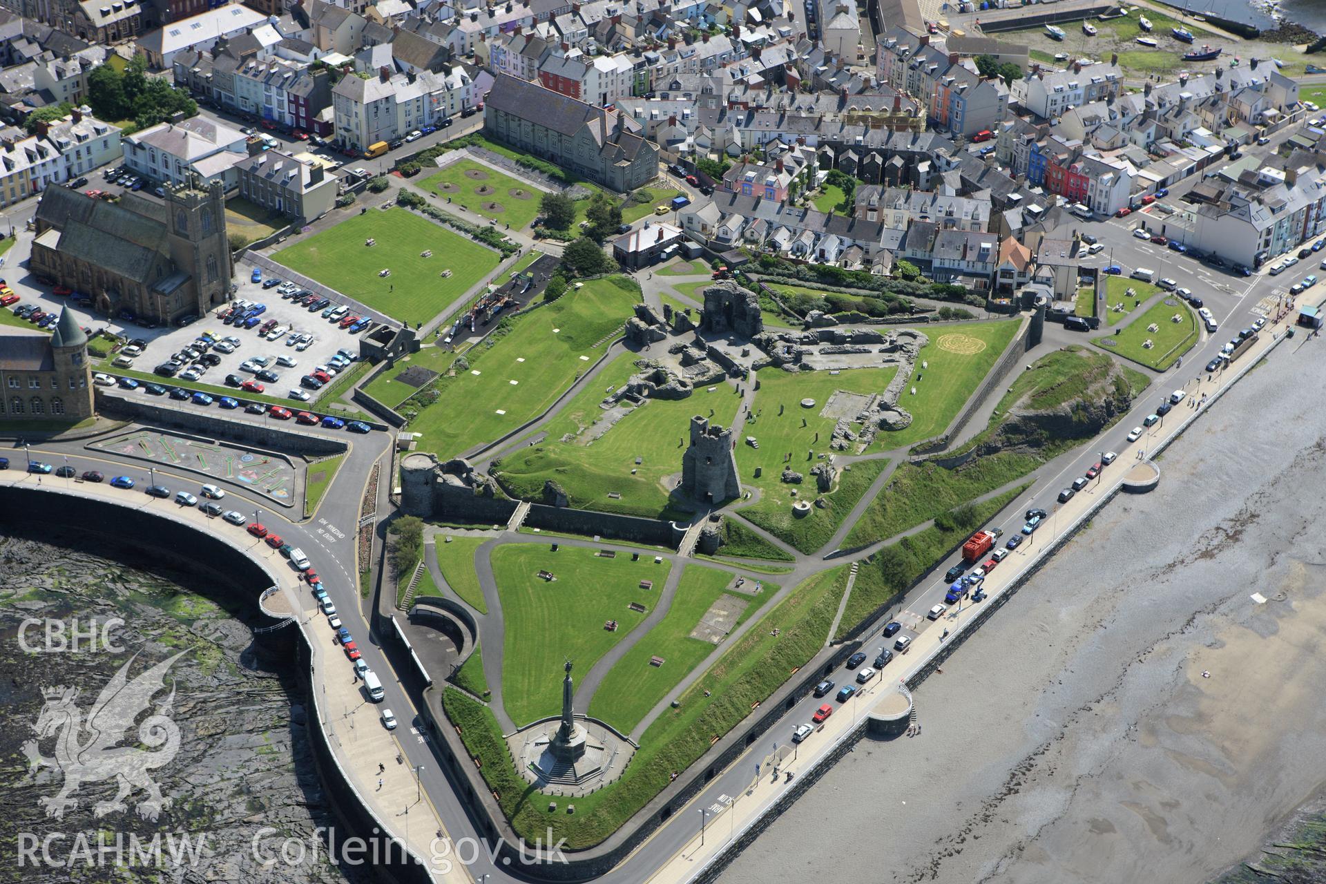 RCAHMW colour oblique aerial photograph of Aberystwyth Castle. Taken on 02 June 2009 by Toby Driver
