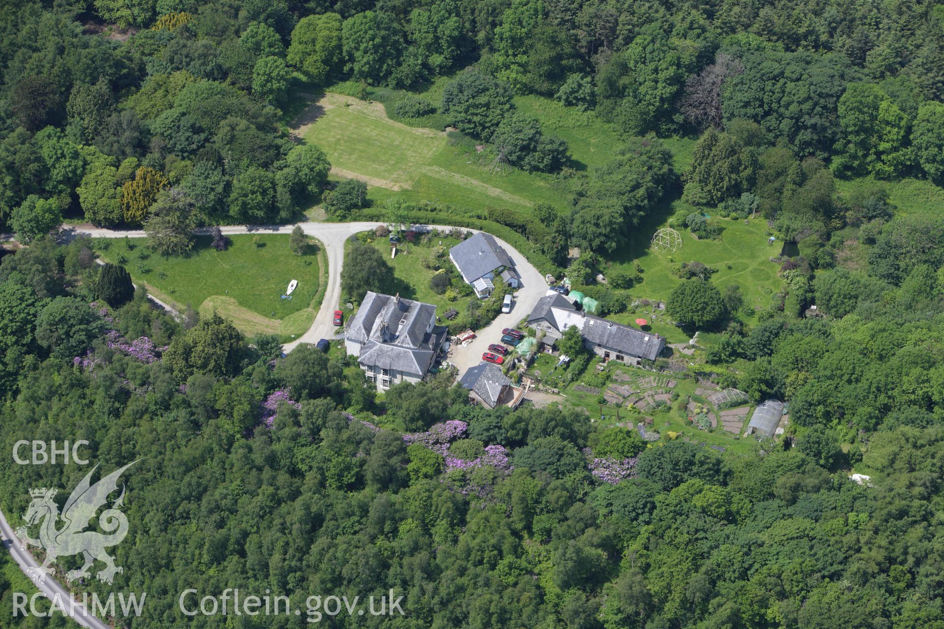 RCAHMW colour oblique aerial photograph of Lodge Park House. Taken on 02 June 2009 by Toby Driver