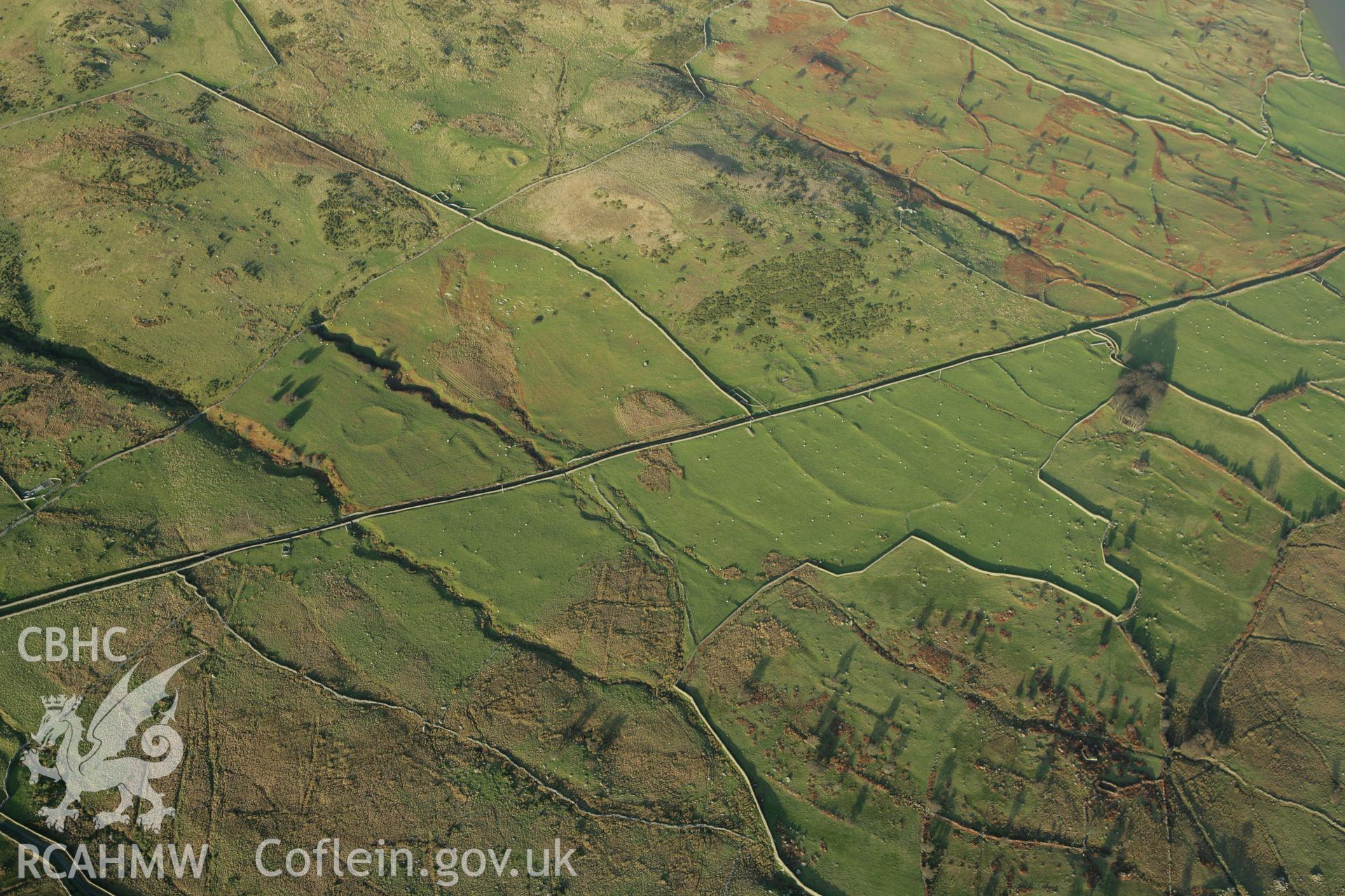 RCAHMW colour oblique aerial photograph of a homestead near Maen-y-Bardd. Taken on 10 December 2009 by Toby Driver