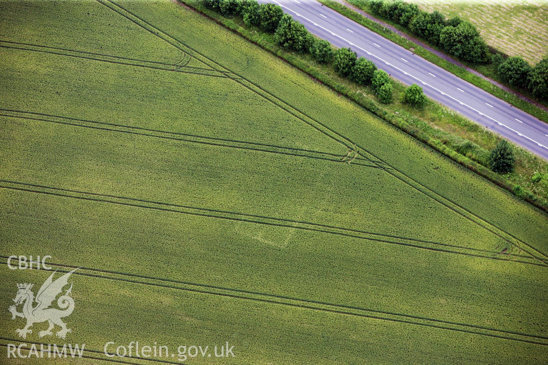 RCAHMW colour oblique aerial photograph of Five Lanes Roman Villa. Taken on 09 July 2009 by Toby Driver