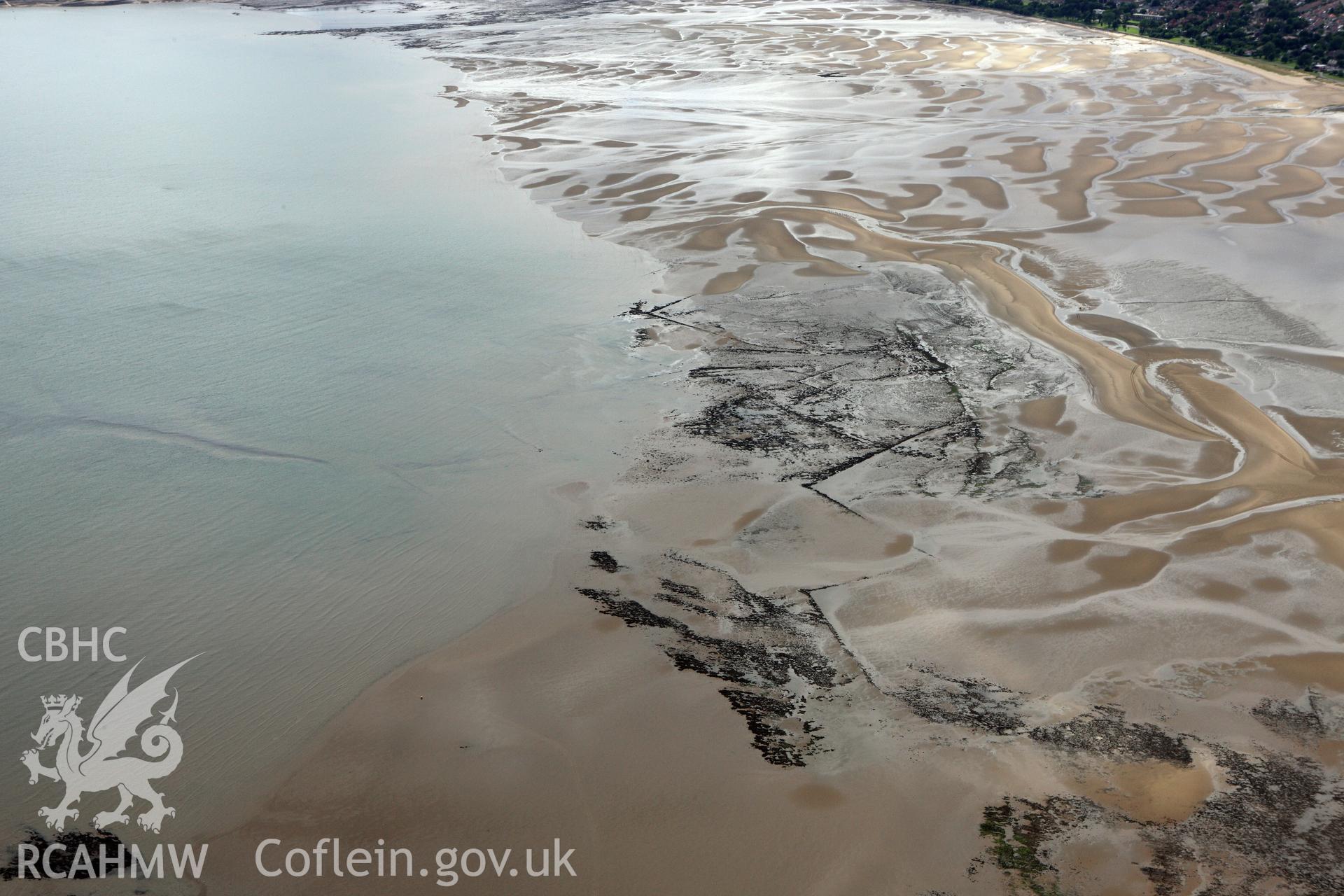 RCAHMW colour oblique aerial photograph of Swansea Bay Fish Traps. Taken on 09 July 2009 by Toby Driver