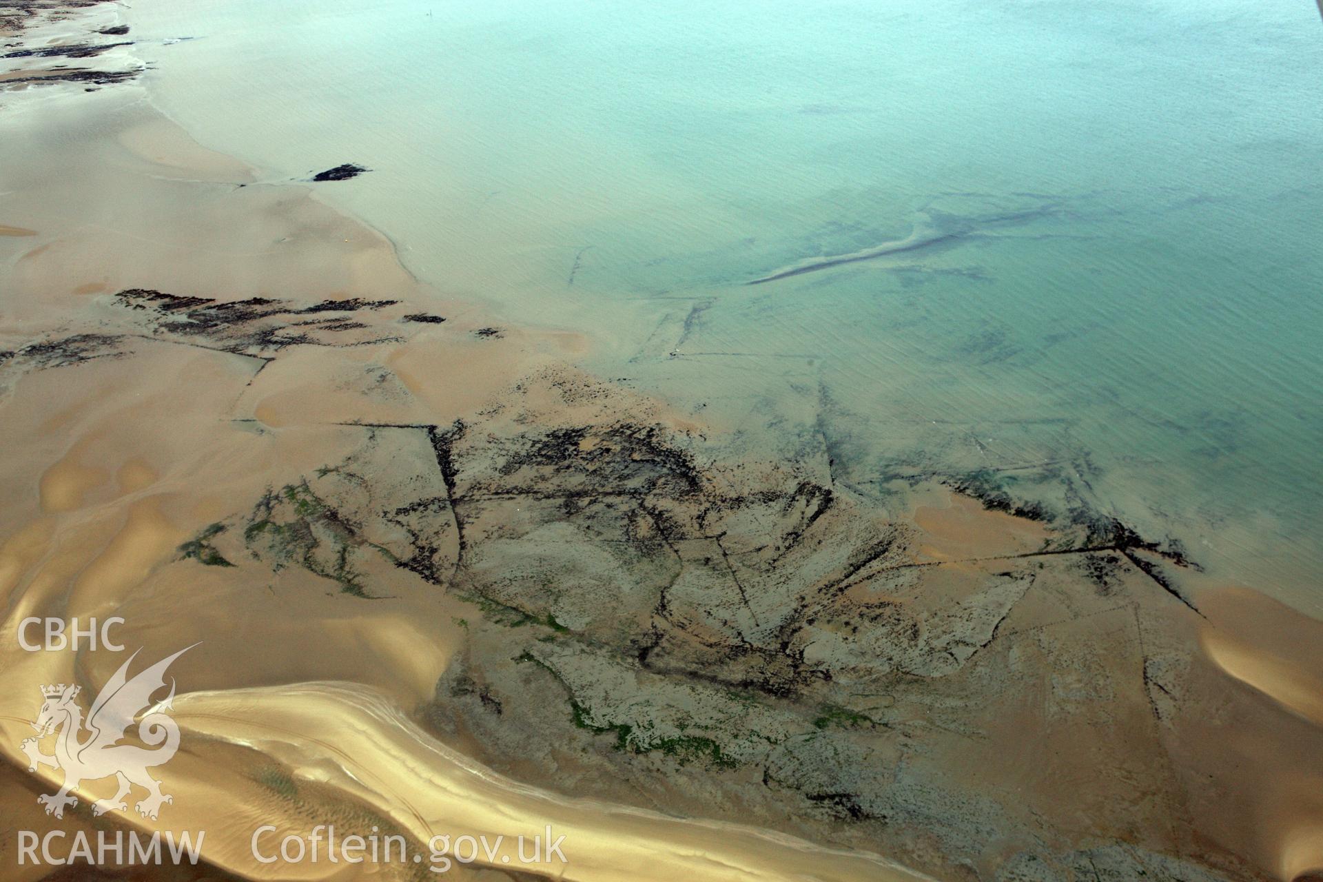 RCAHMW colour oblique aerial photograph of Swansea Bay Fish Traps. Taken on 09 July 2009 by Toby Driver