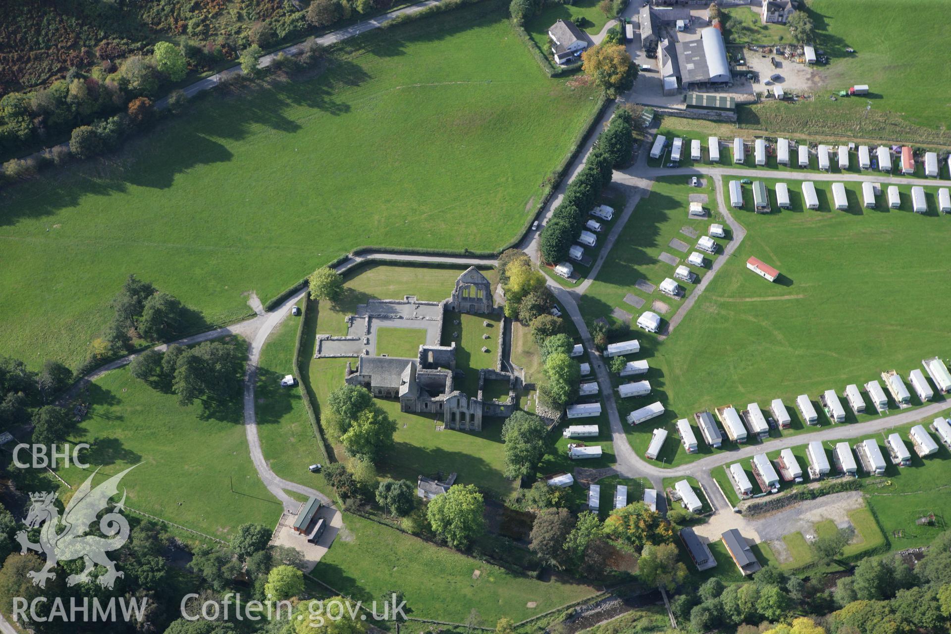 RCAHMW colour oblique aerial photograph of Valle Crucis Abbey. Taken on 13 October 2009 by Toby Driver