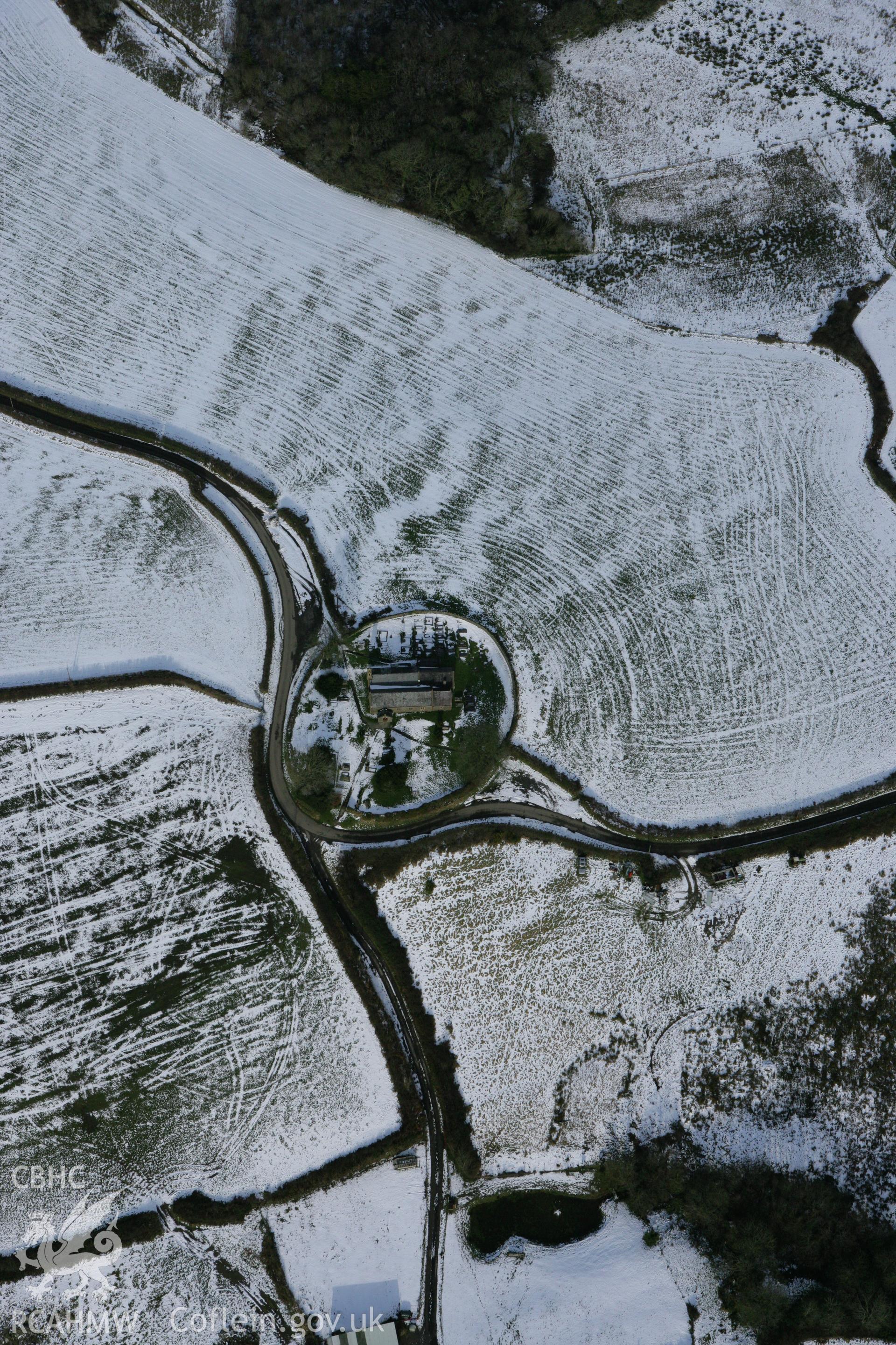 RCAHMW colour oblique photograph of St Cynog's church. Taken by Toby Driver on 06/02/2009.