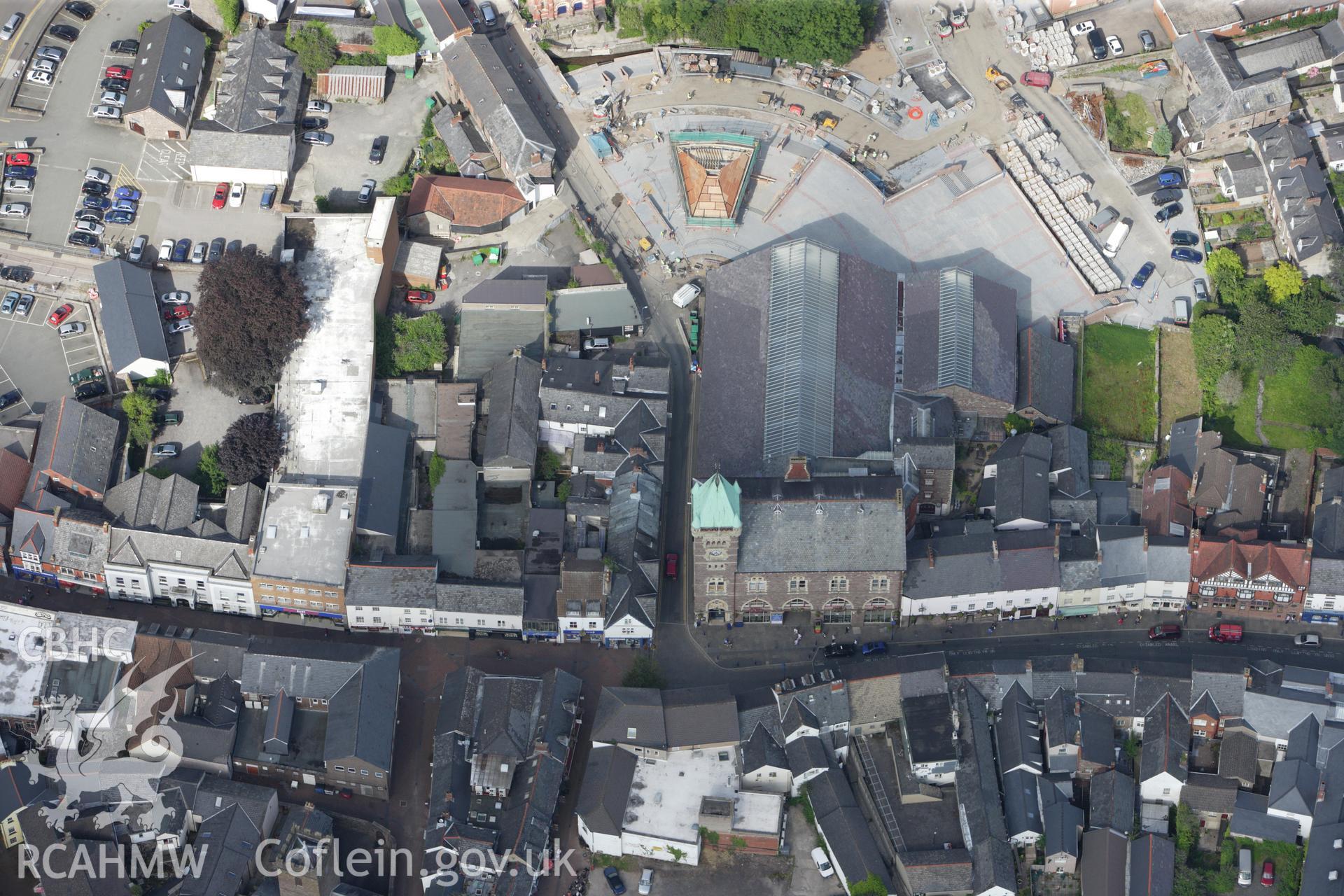 RCAHMW colour oblique aerial photograph of the town hall and adjacent market hall, Abergavenny. Taken on 23 July 2009 by Toby Driver