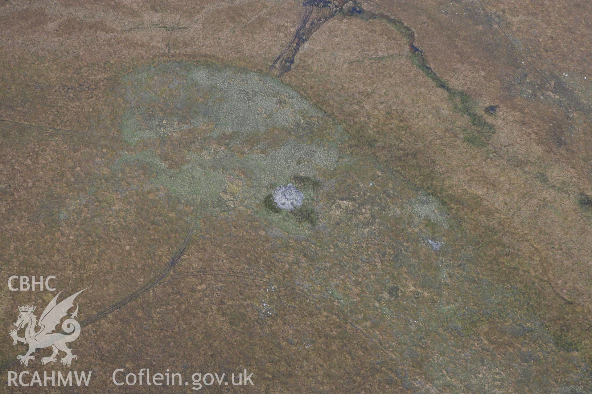 RCAHMW colour oblique aerial photograph of Mynydd-y-Glog Cairn. Taken on 14 October 2009 by Toby Driver