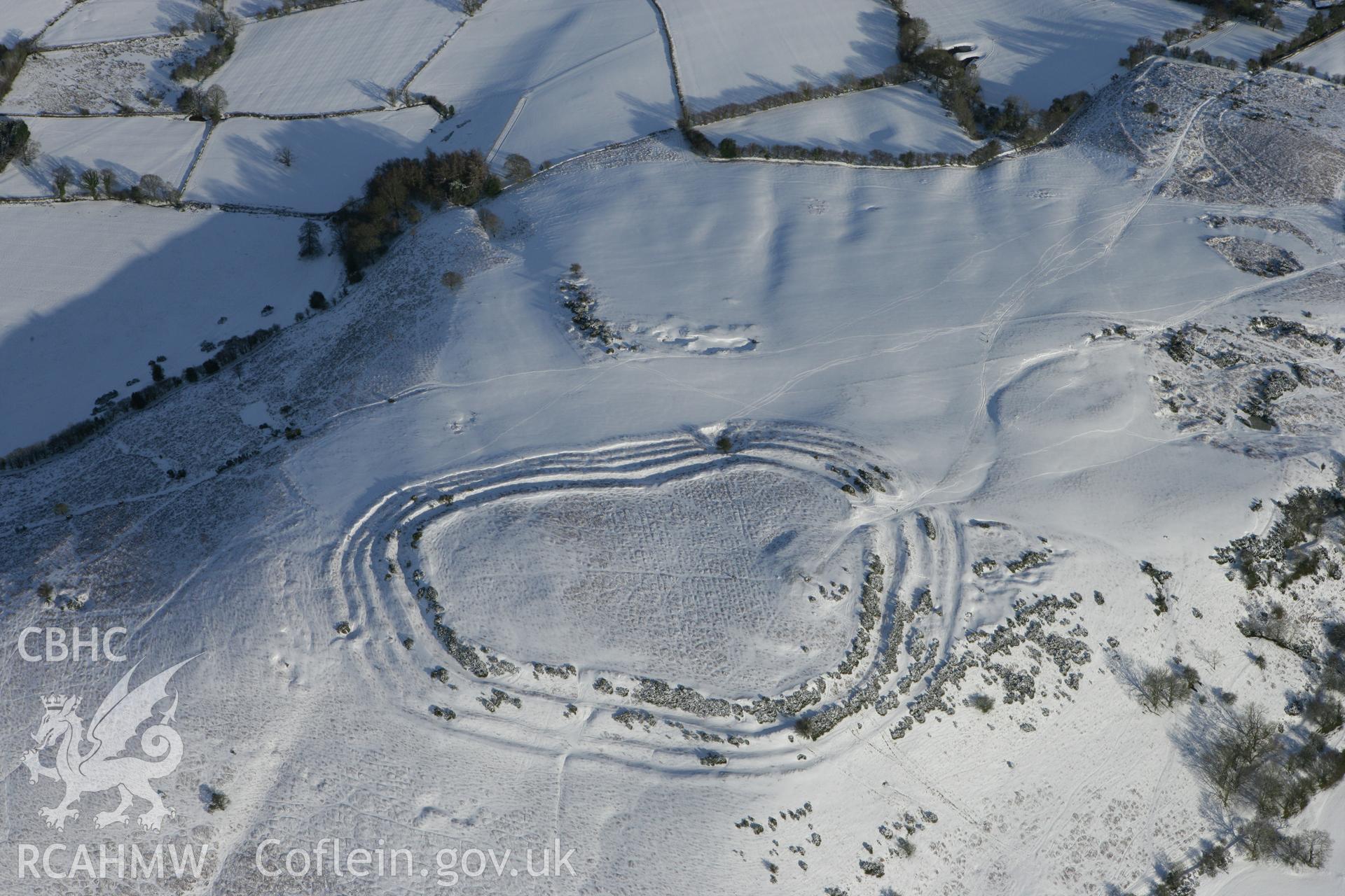 RCAHMW colour oblique photograph of Pen y Crug hillfort. Taken by Toby Driver on 06/02/2009.