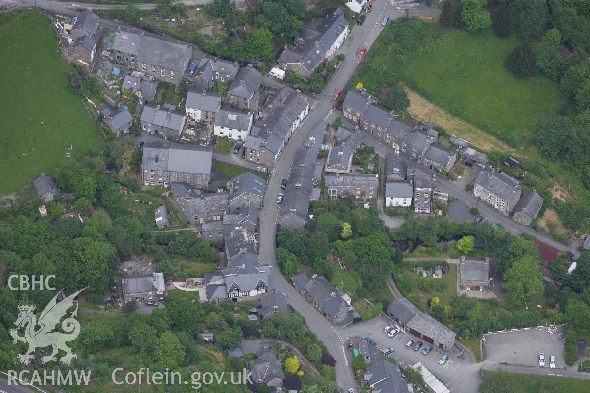 RCAHMW colour oblique aerial photograph of Corris Village. Taken on 02 June 2009 by Toby Driver