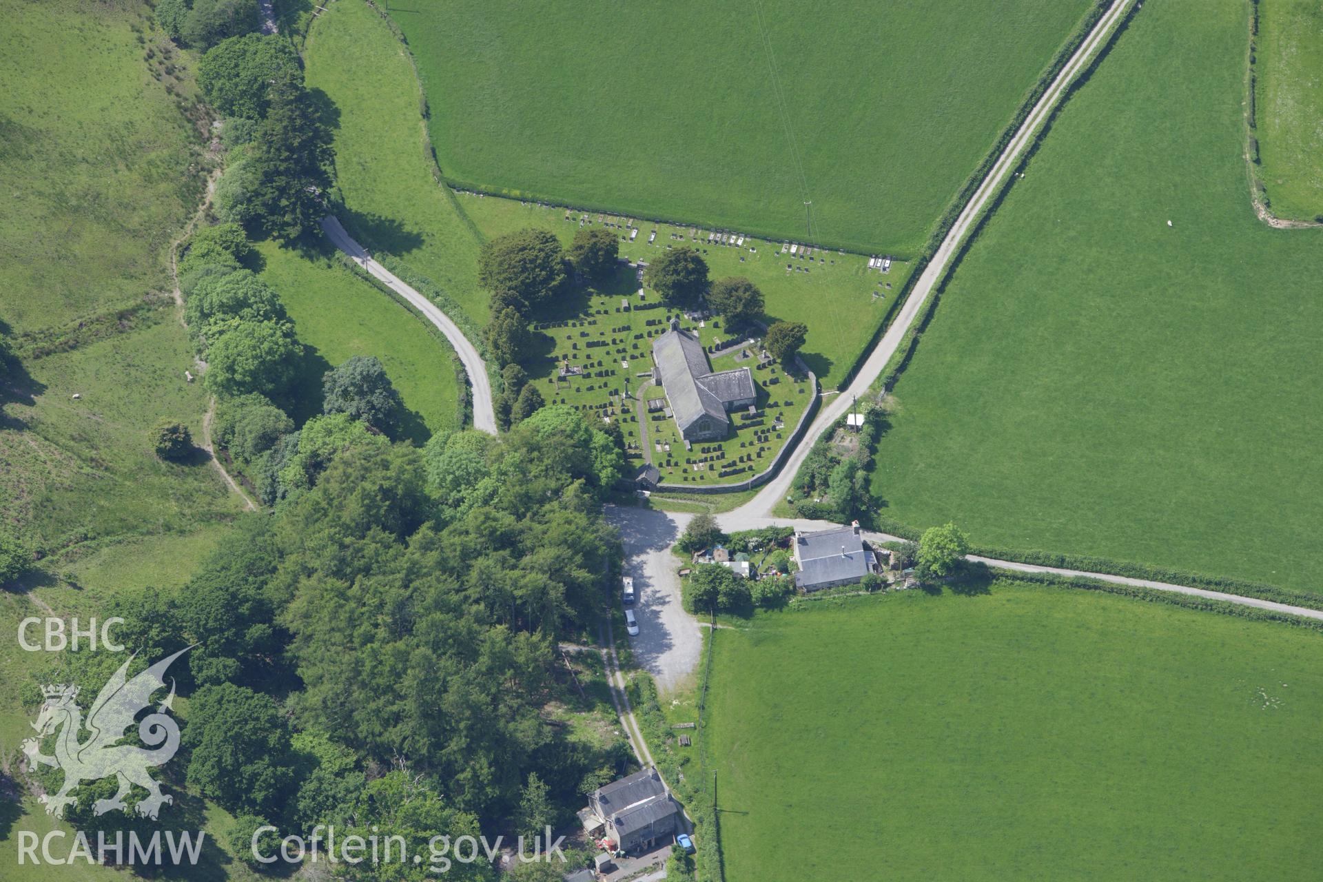 RCAHMW colour oblique aerial photograph of St Michaels Church, Llanfihangel-y-Pennant. Taken on 02 June 2009 by Toby Driver