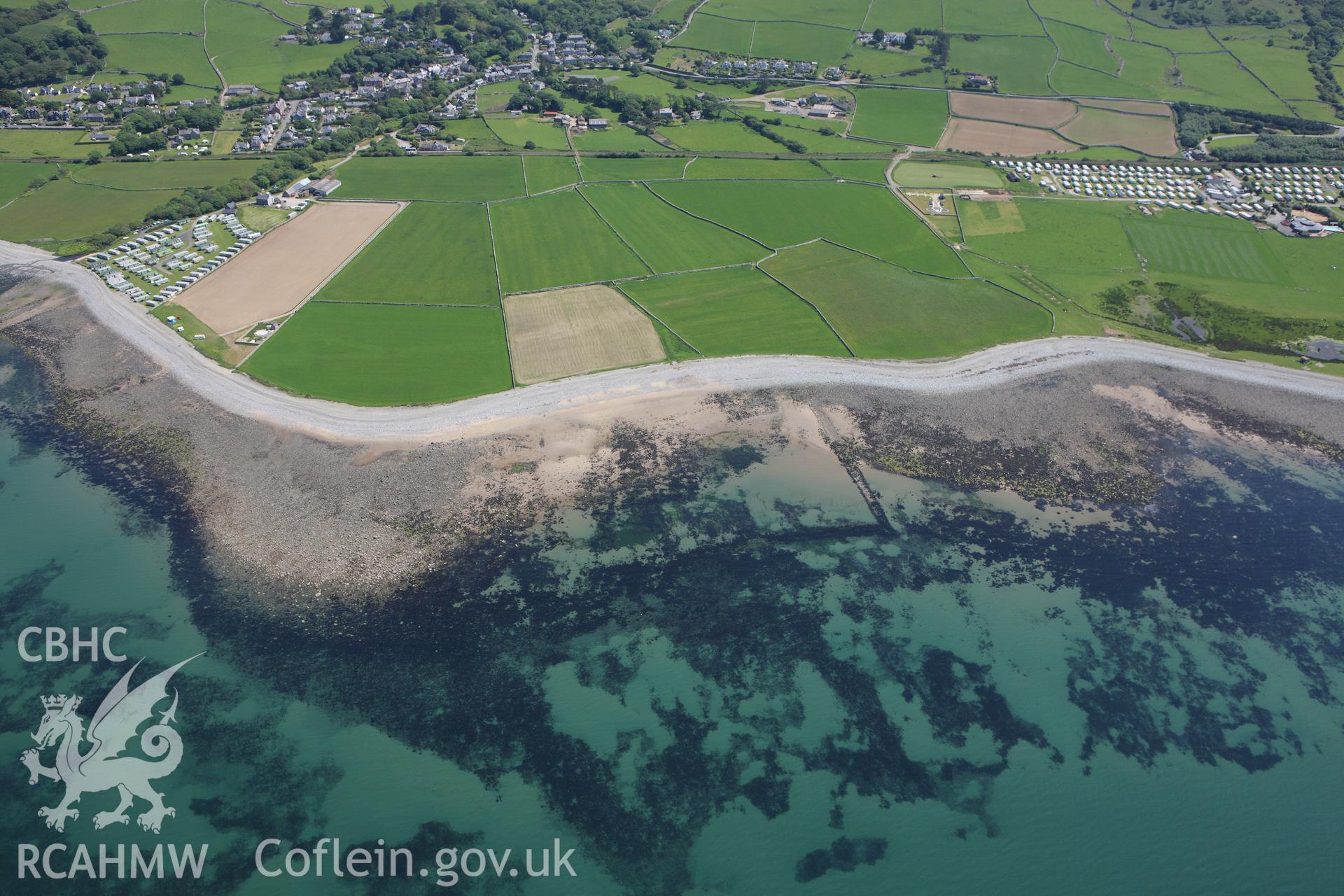RCAHMW colour oblique aerial photograph of Llwyngwril Fish Trap I Taken on 02 June 2009 by Toby Driver