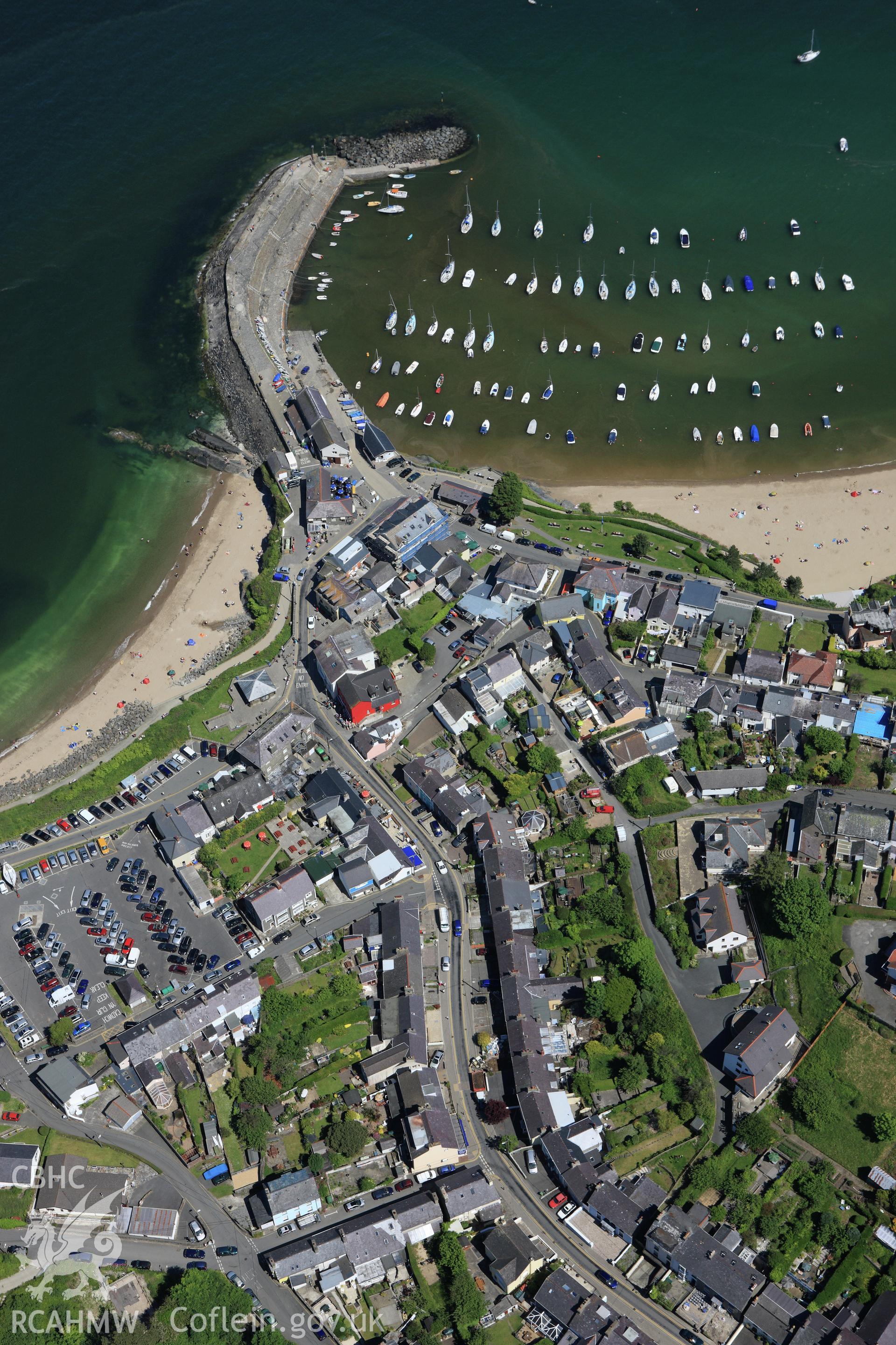 RCAHMW colour oblique aerial photograph of New Quay. Taken on 01 June 2009 by Toby Driver