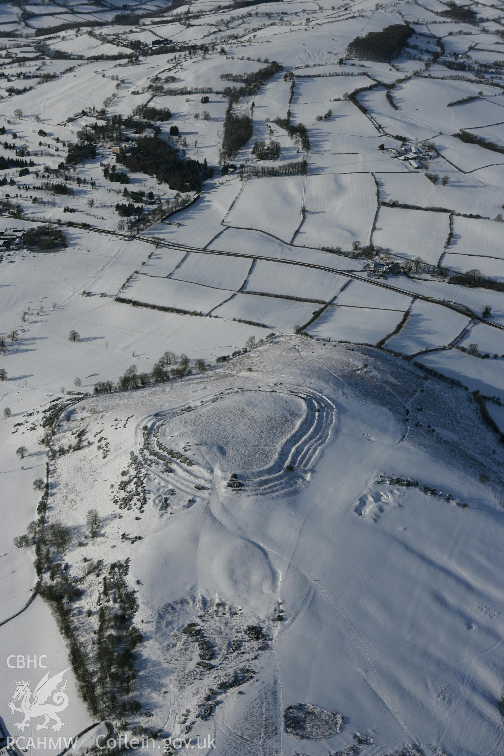 RCAHMW colour oblique photograph of Pen y Crug hillfort. Taken by Toby Driver on 06/02/2009.
