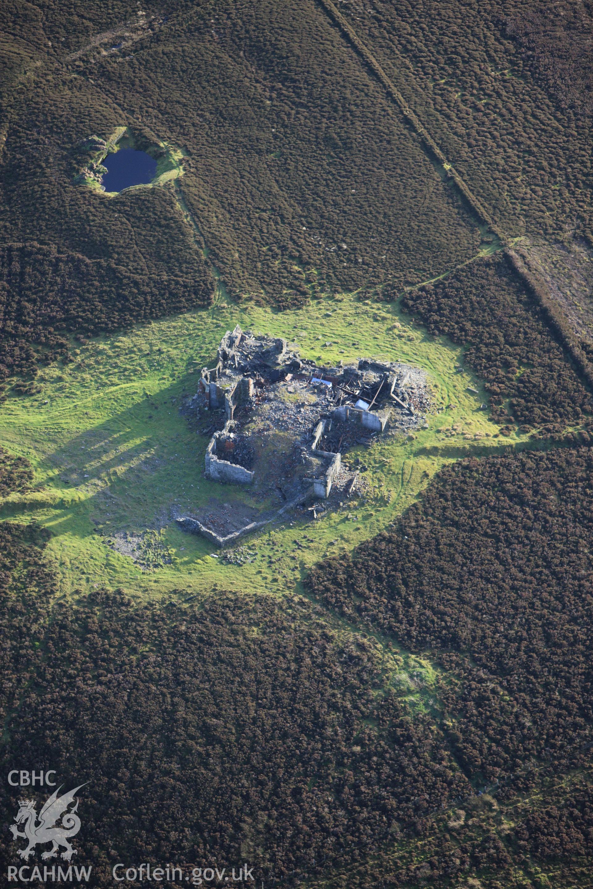 RCAHMW colour oblique aerial photograph of Gwylfa Hiraethog Shooting Lodge, in ruins. Taken on 10 December 2009 by Toby Driver