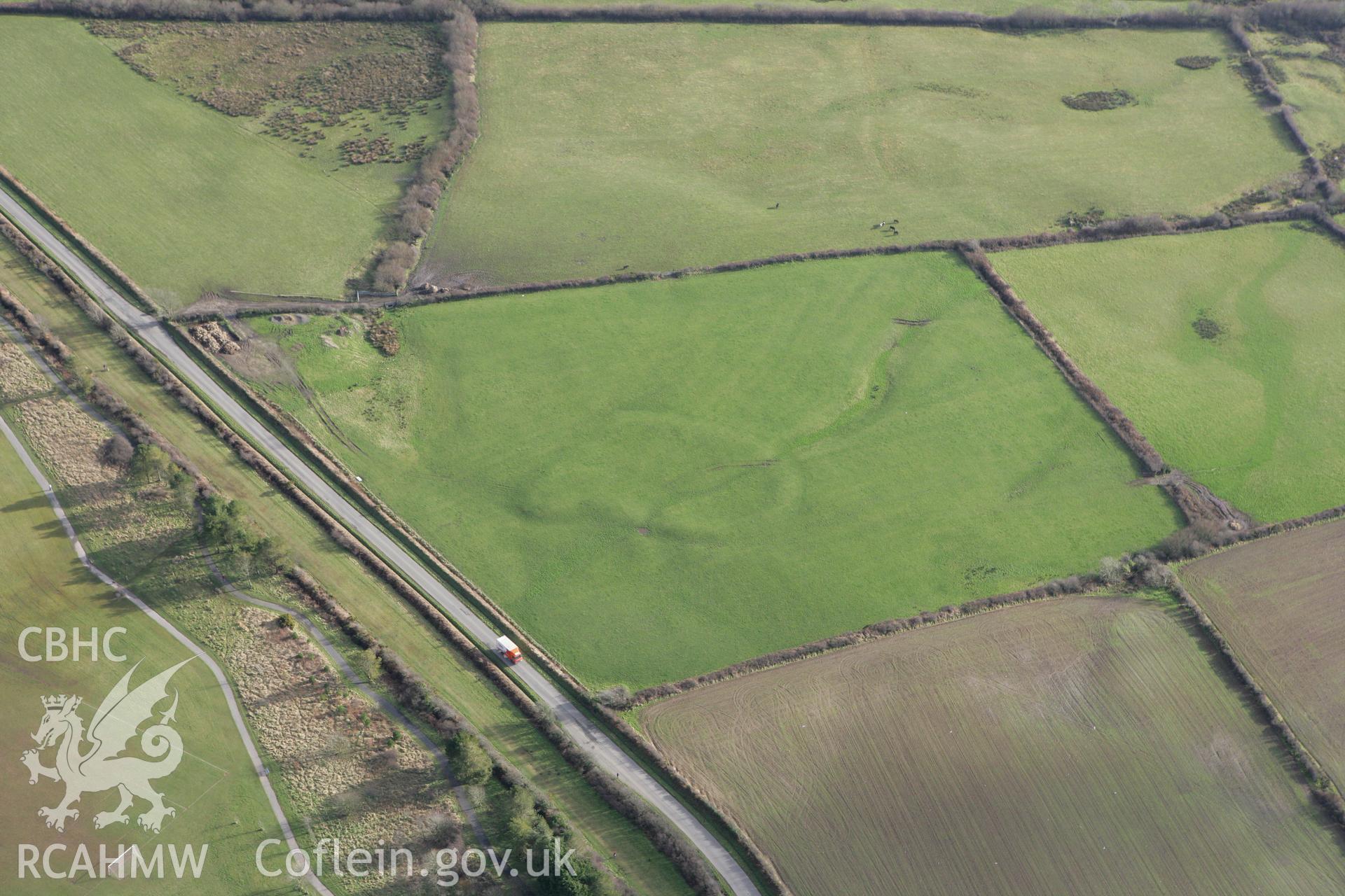 RCAHMW colour oblique photograph of South Cuckoo enclosure, Haverfordwest. Taken by Toby Driver on 11/02/2009.