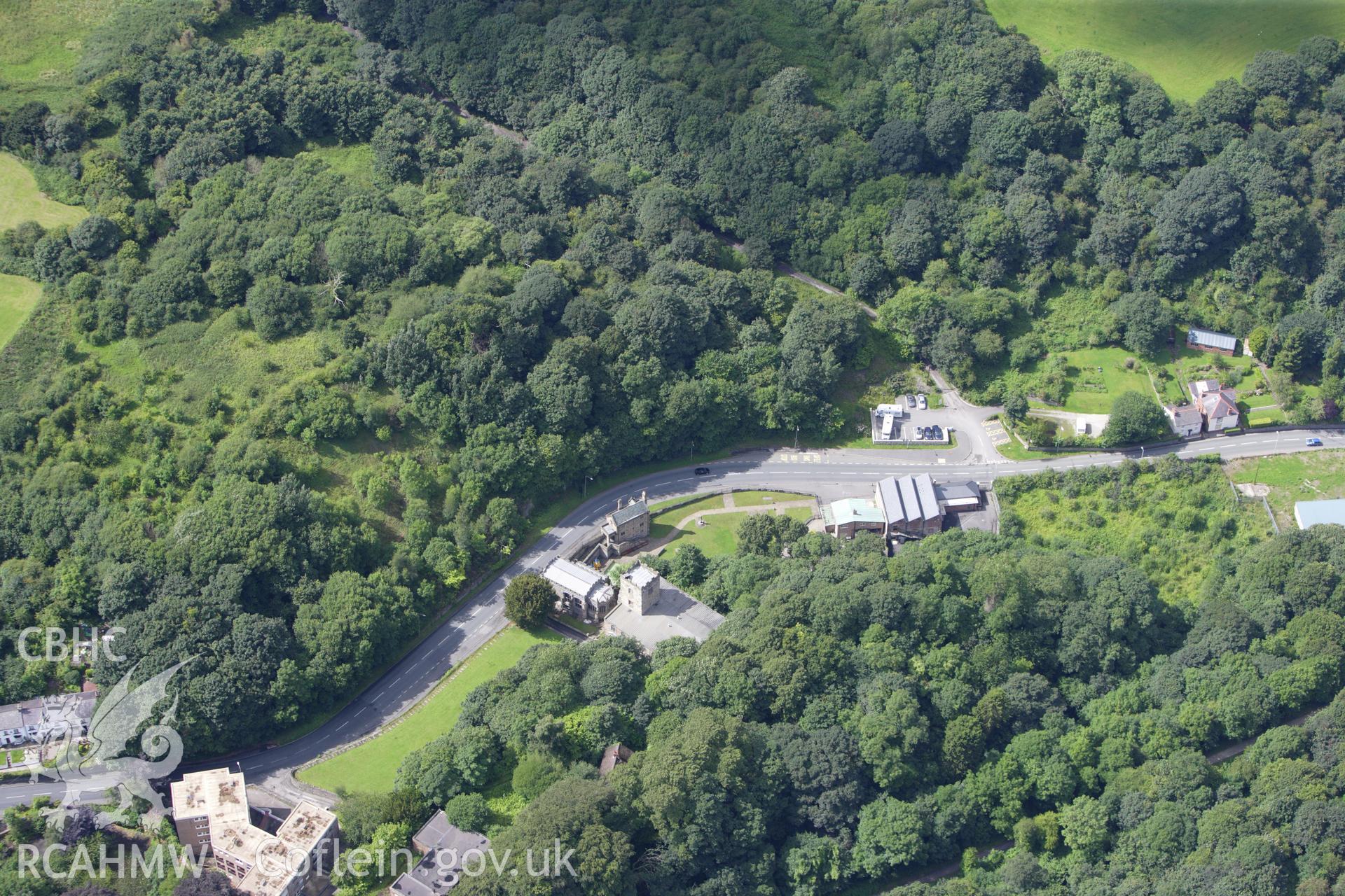 RCAHMW colour oblique aerial photograph of Holywell Castle Mound. Taken on 30 July 2009 by Toby Driver
