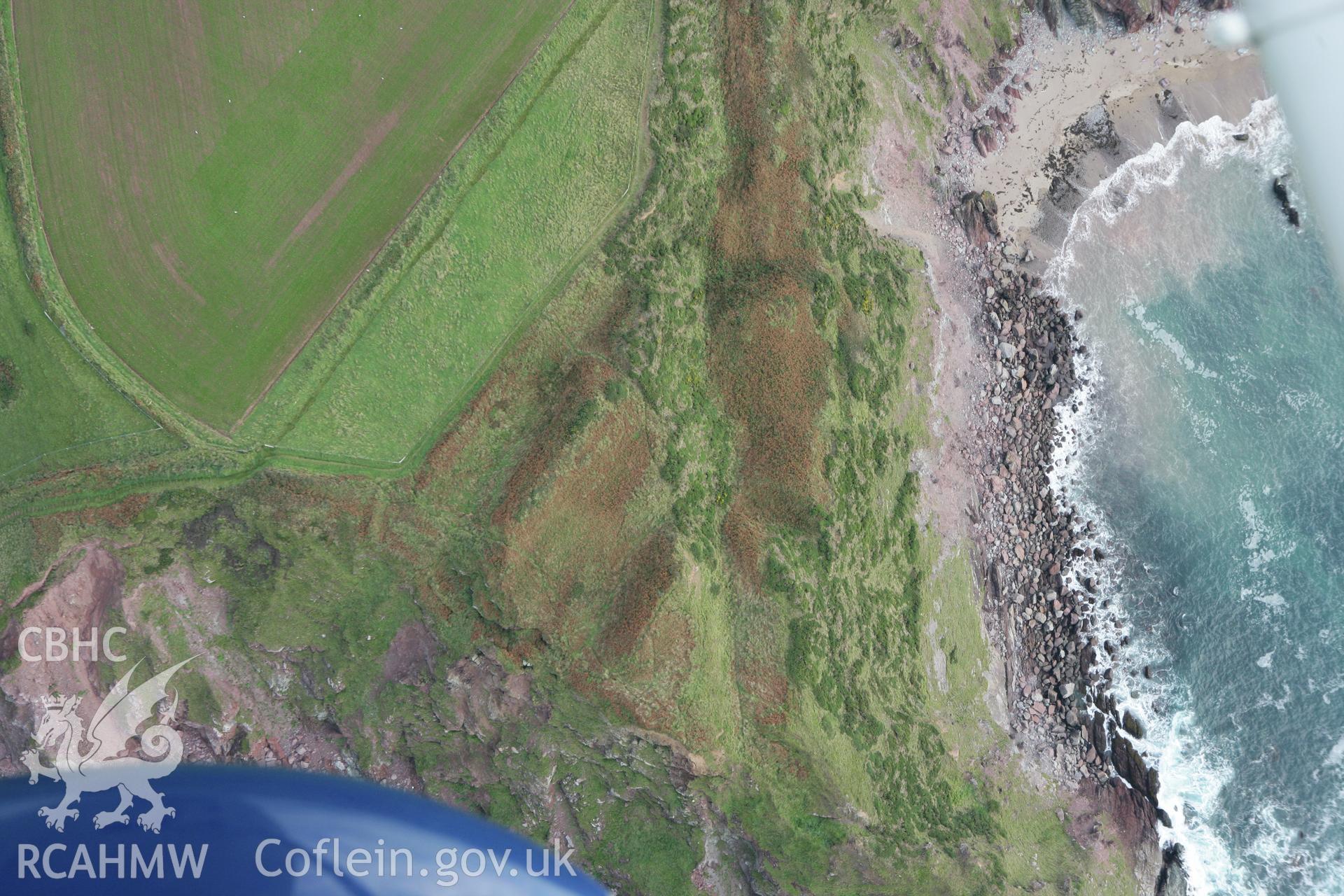 RCAHMW colour oblique aerial photograph of Great Castle Head Promontory Fort. Taken on 14 October 2009 by Toby Driver