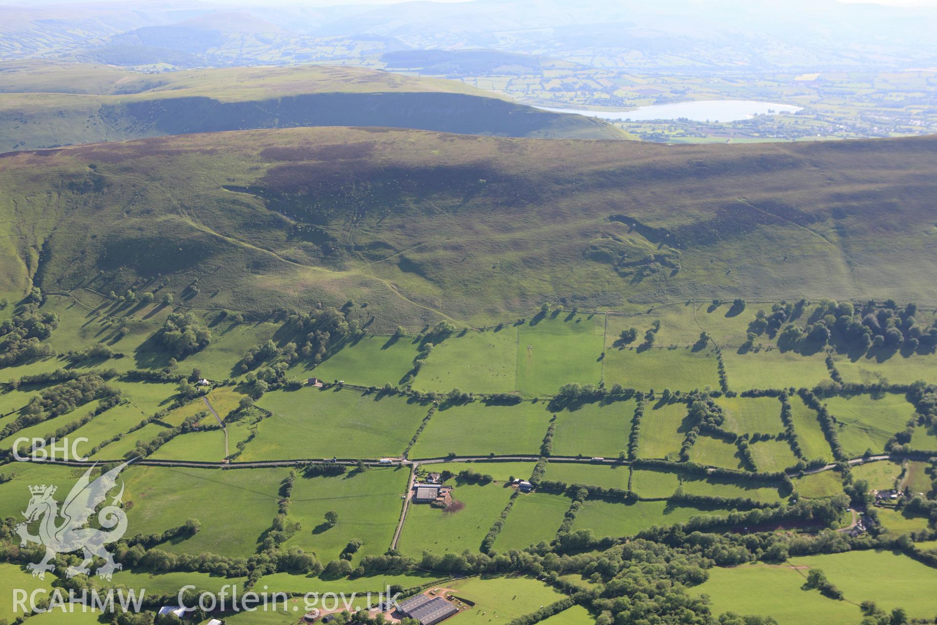 RCAHMW colour oblique aerial photograph of Mynydd Troed. Taken on 11 June 2009 by Toby Driver