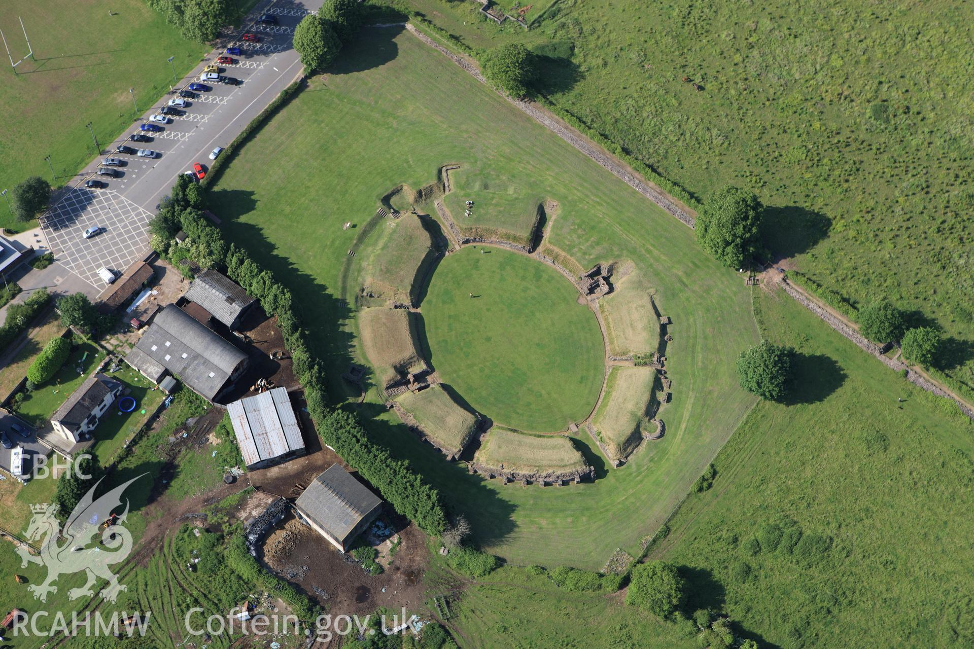 RCAHMW colour oblique aerial photograph of Caerleon Roman Amphitheatre. Taken on 11 June 2009 by Toby Driver