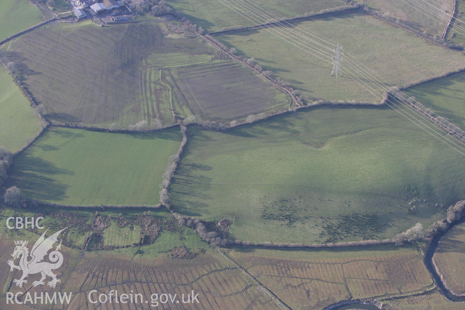 RCAHMW colour oblique photograph of Trefenty Standing stone. Taken by Toby Driver on 11/02/2009.