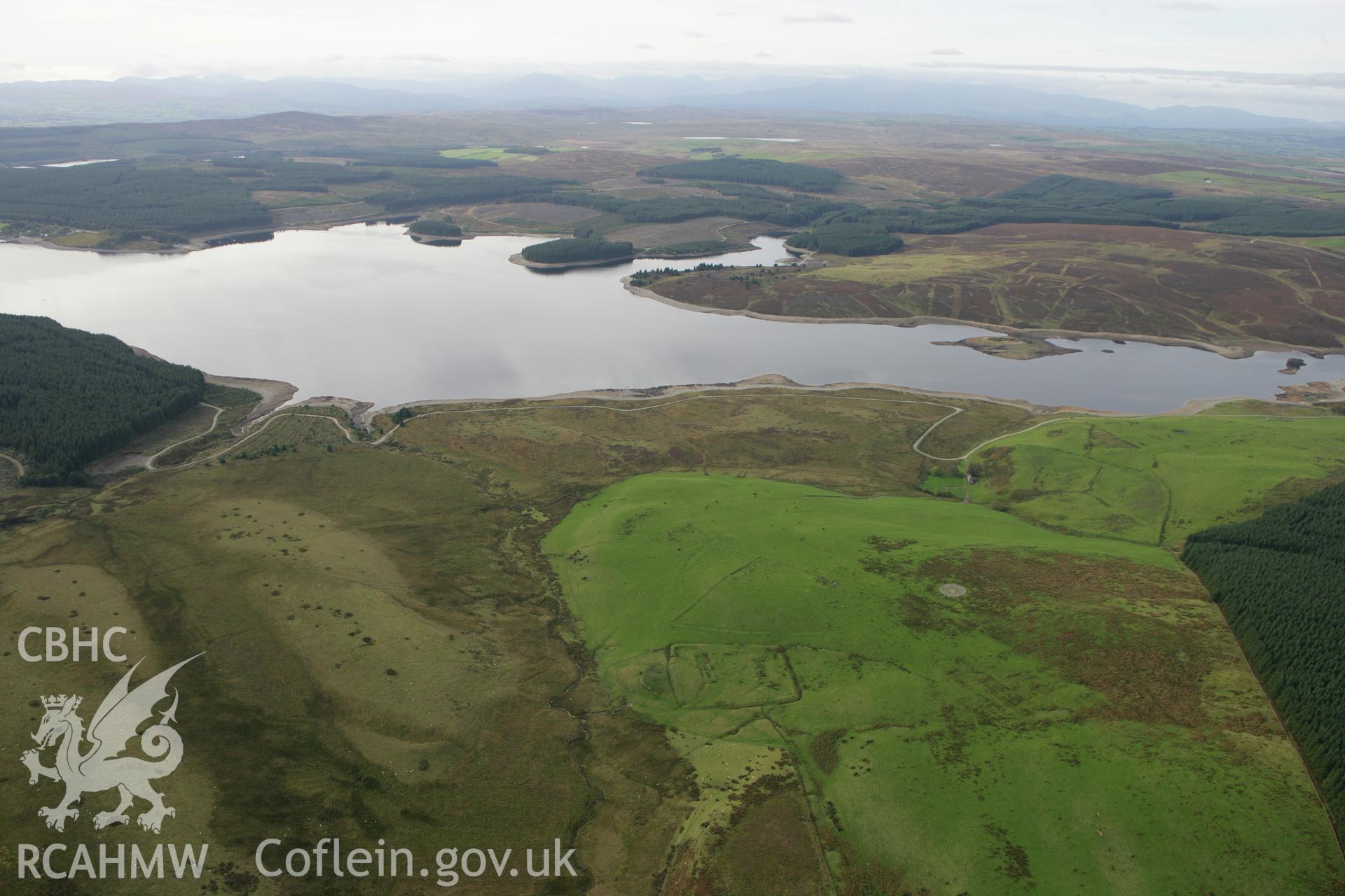 RCAHMW colour oblique aerial photograph of Hen Ddinbych showing landscape looking west towards Llyn Brenig Taken on 13 October 2009 by Toby Driver