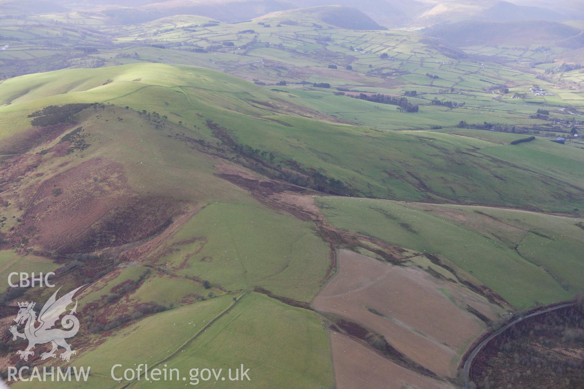 RCAHMW colour oblique aerial photograph of a section of the Monk's Trod from Abbey Cwm Hir to Park and Moel Hywel. Taken on 10 December 2009 by Toby Driver