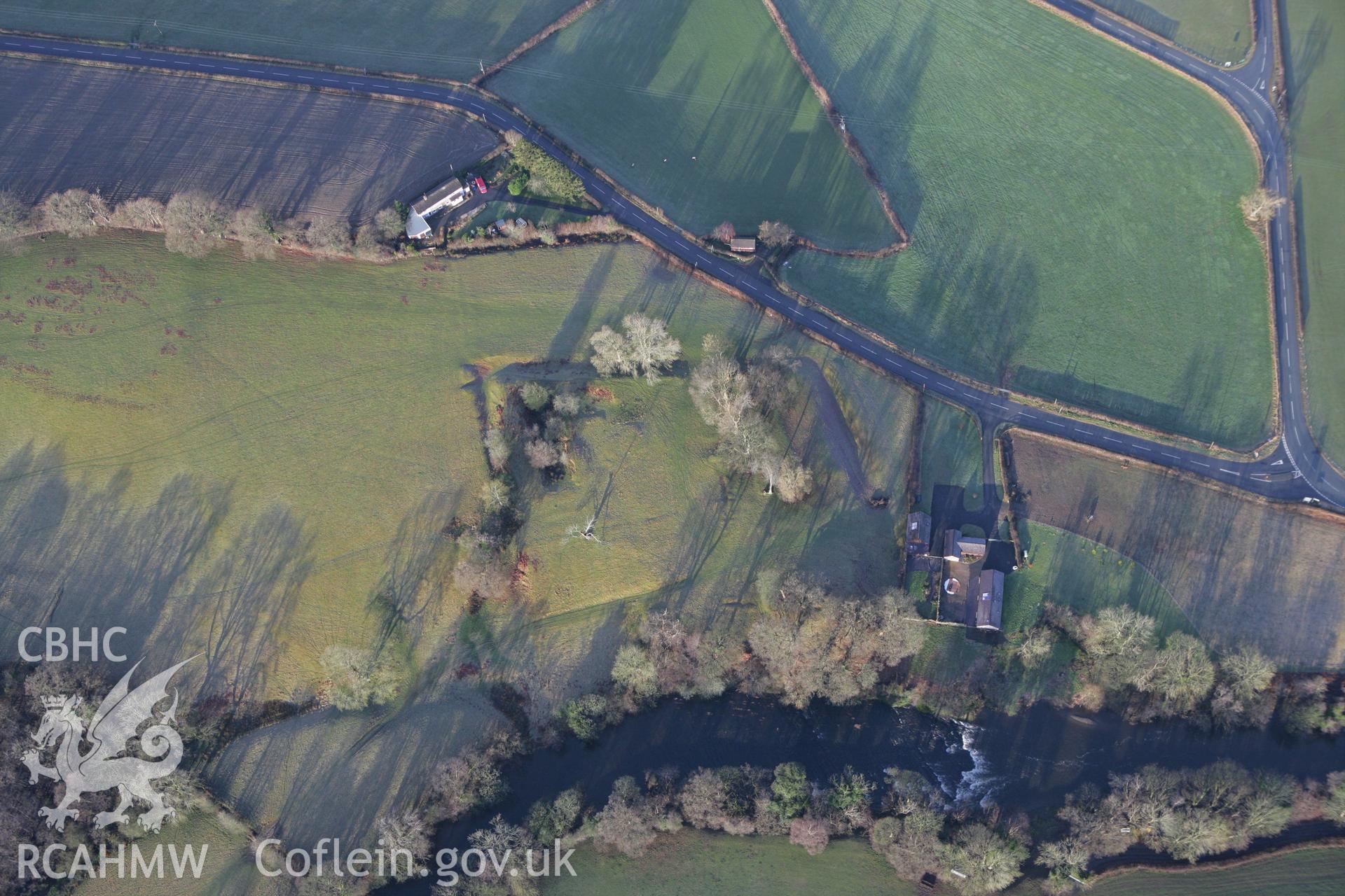 RCAHMW colour oblique photograph of Mathrafal defended enclosure. Taken by Toby Driver on 21/01/2009.