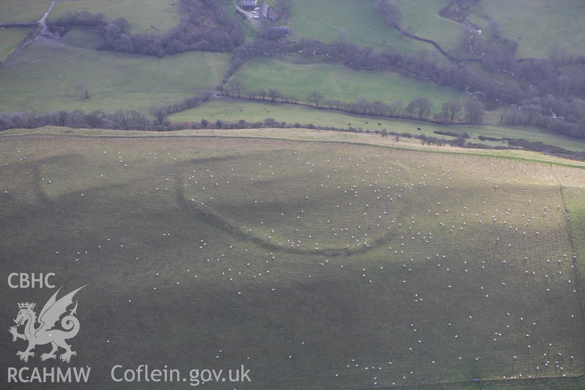RCAHMW colour oblique aerial photograph of Llyssin Hill Hillfort and Crossdykes. Taken on 10 December 2009 by Toby Driver