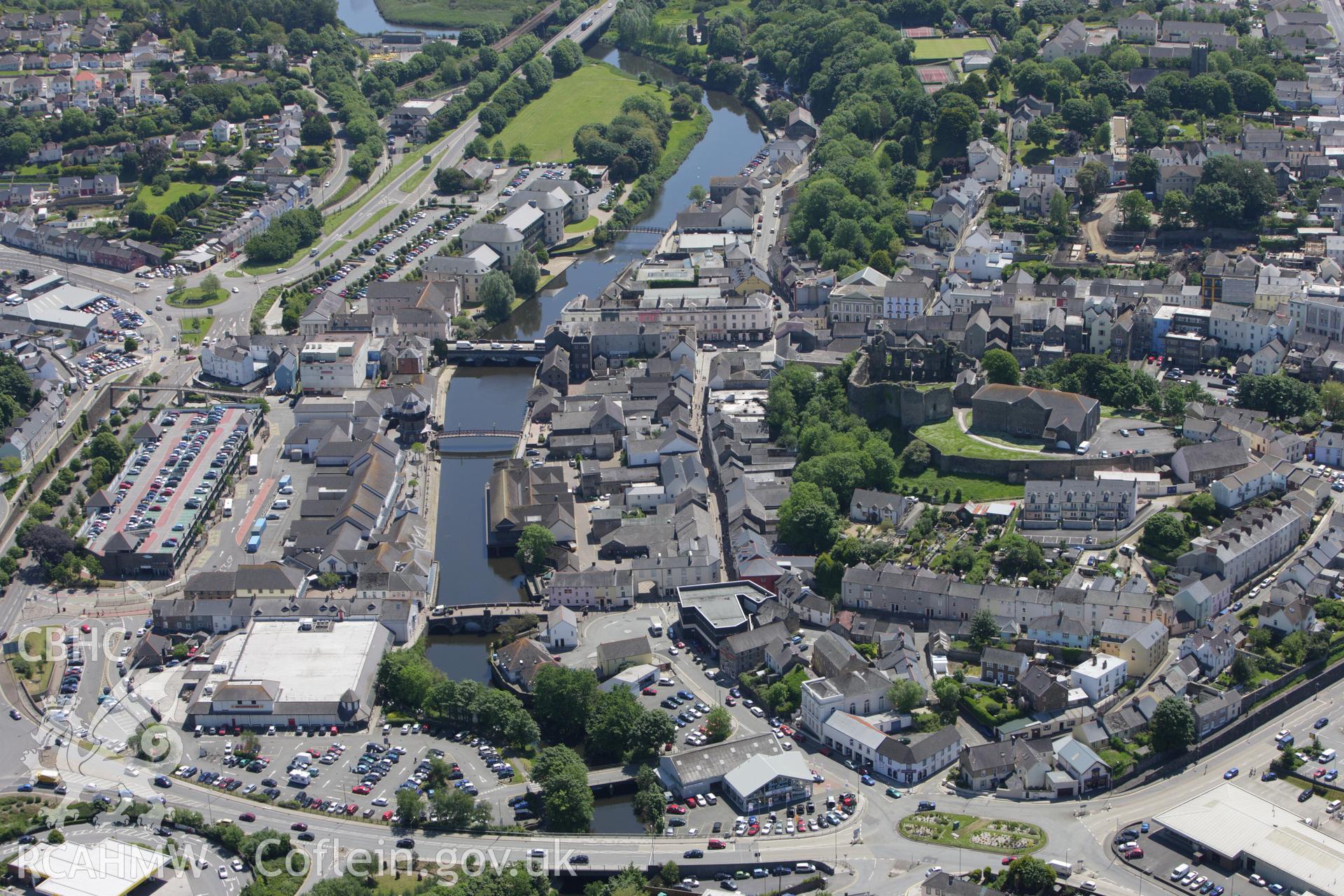 RCAHMW colour oblique aerial photograph of general view including Haverfordwest Castle. Taken on 01 June 2009 by Toby Driver