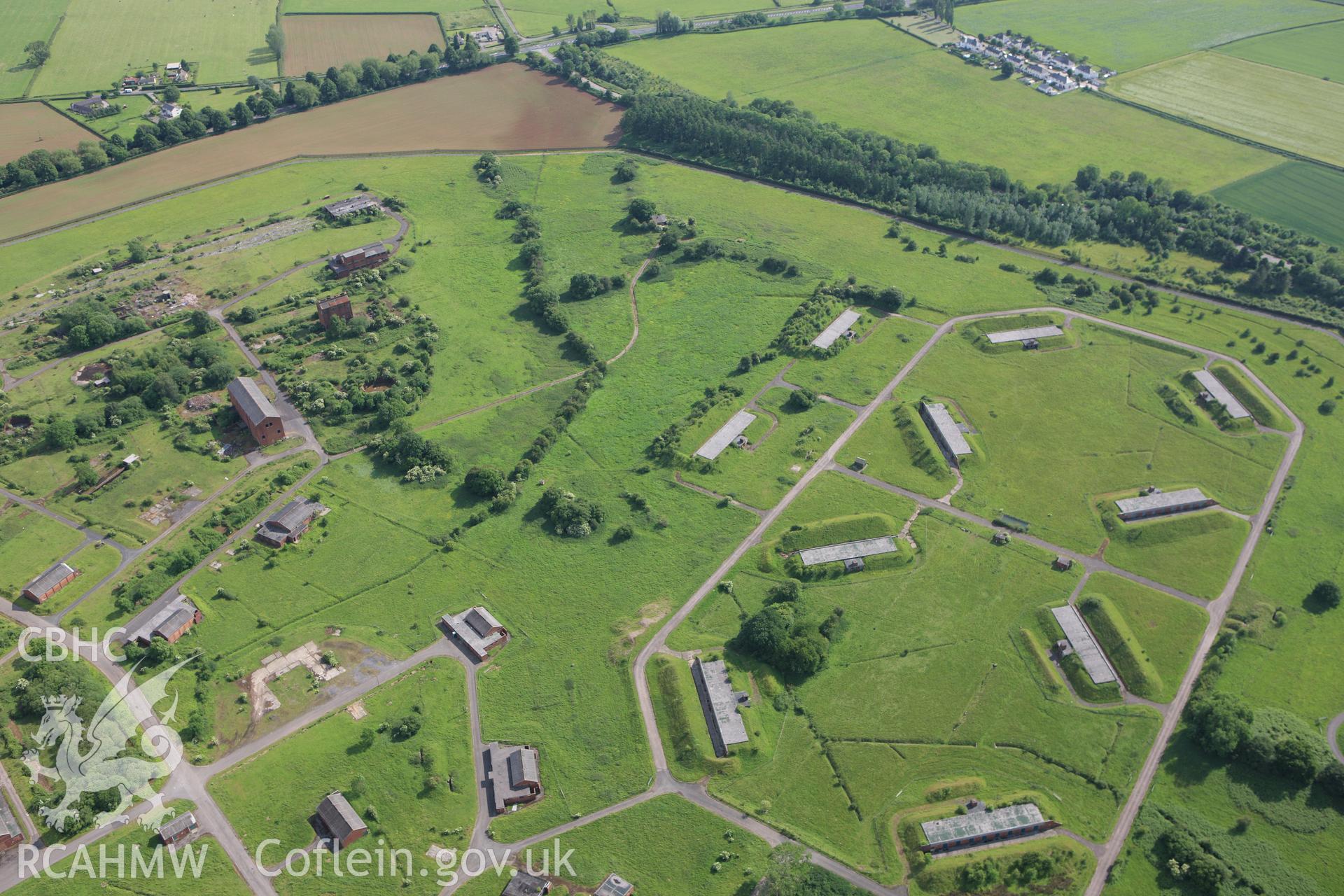 RCAHMW colour oblique aerial photograph of Caerwent Royal Naval Propellant Factory. Taken on 11 June 2009 by Toby Driver