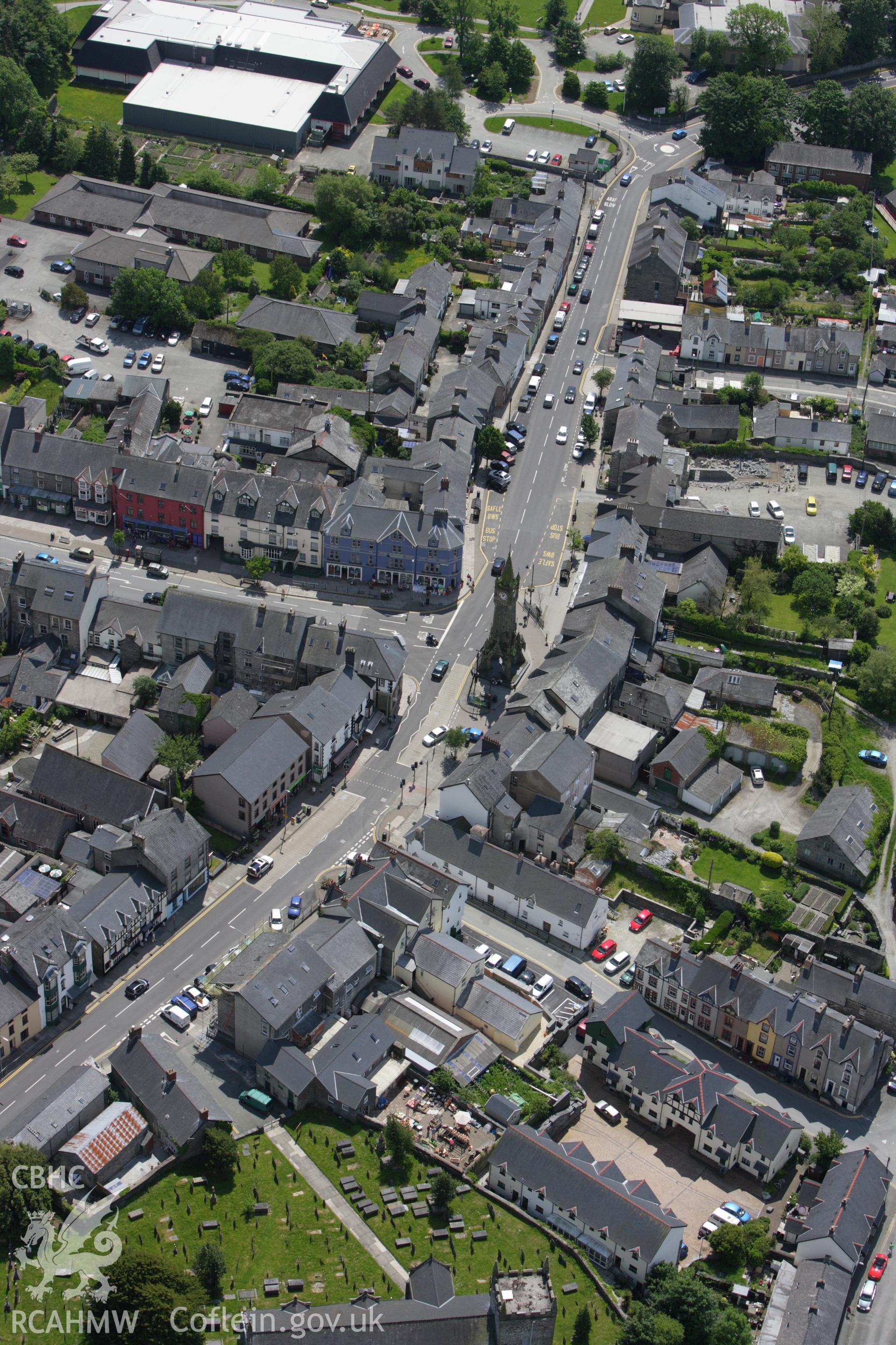 RCAHMW colour oblique aerial photograph of Machynlleth town. Taken on 02 June 2009 by Toby Driver