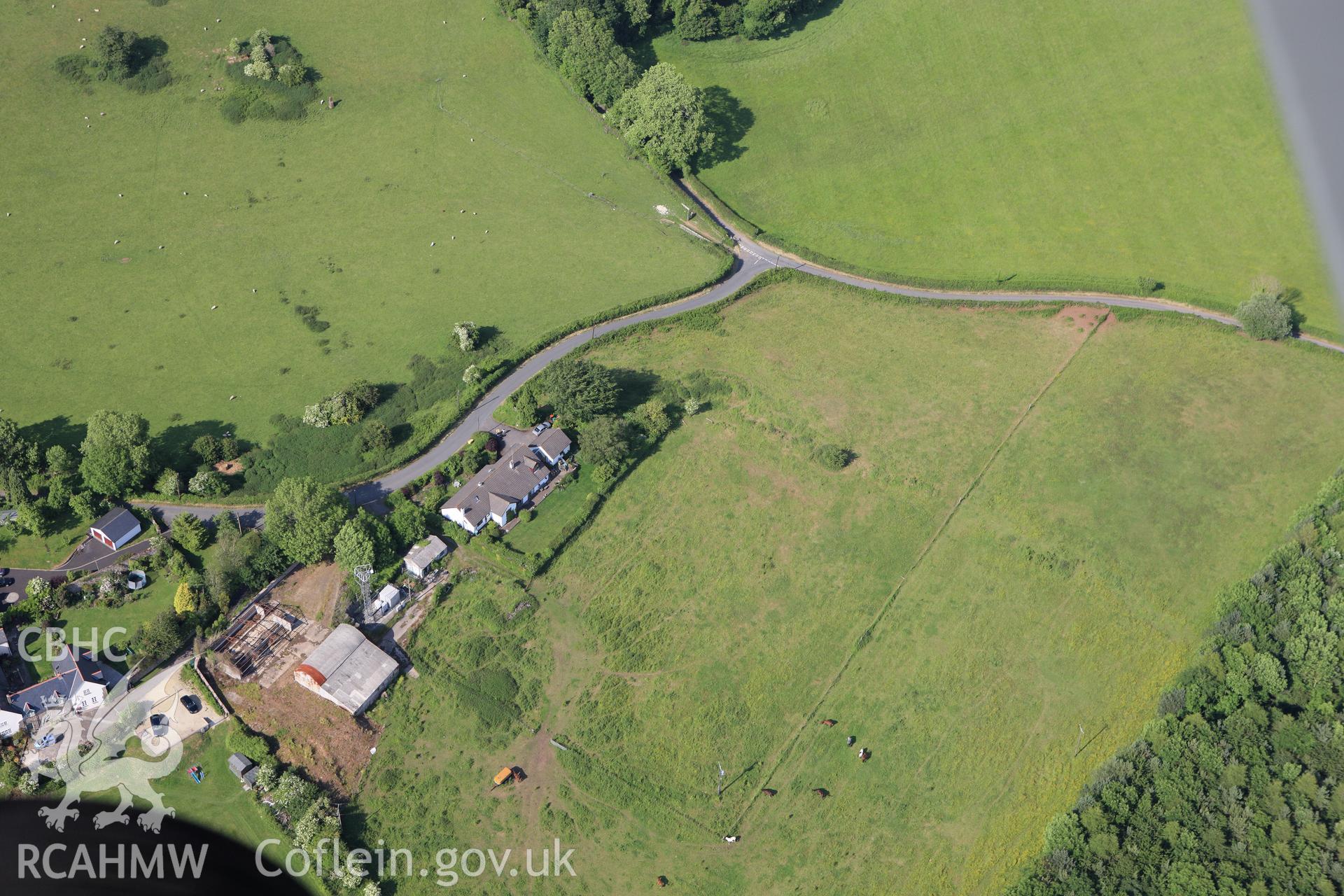 RCAHMW colour oblique aerial photograph of Talgarth Settlement Earthworks. Taken on 11 June 2009 by Toby Driver