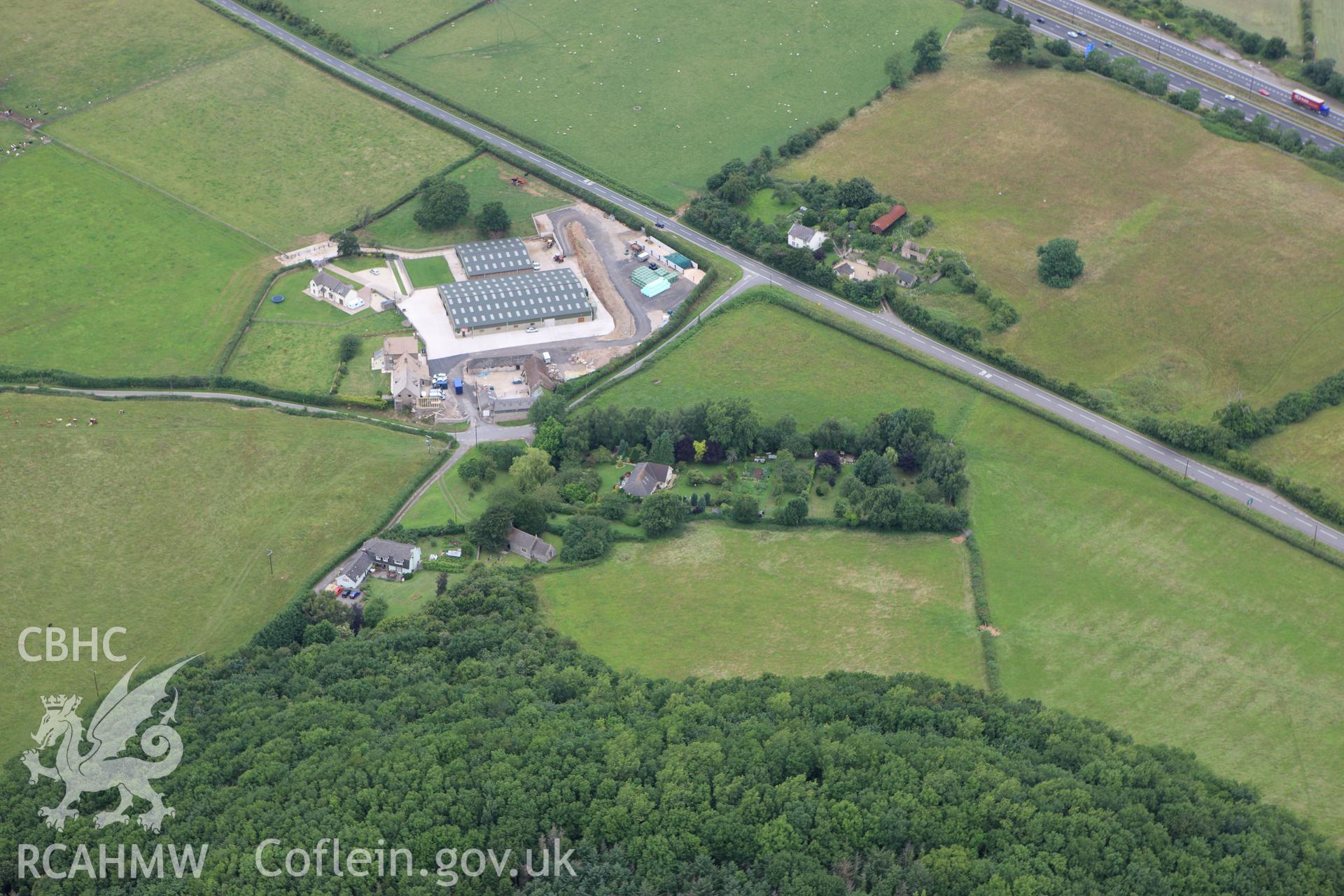 RCAHMW colour oblique aerial photograph of Wilcrick Hill Defended Enclosure. Taken on 09 July 2009 by Toby Driver