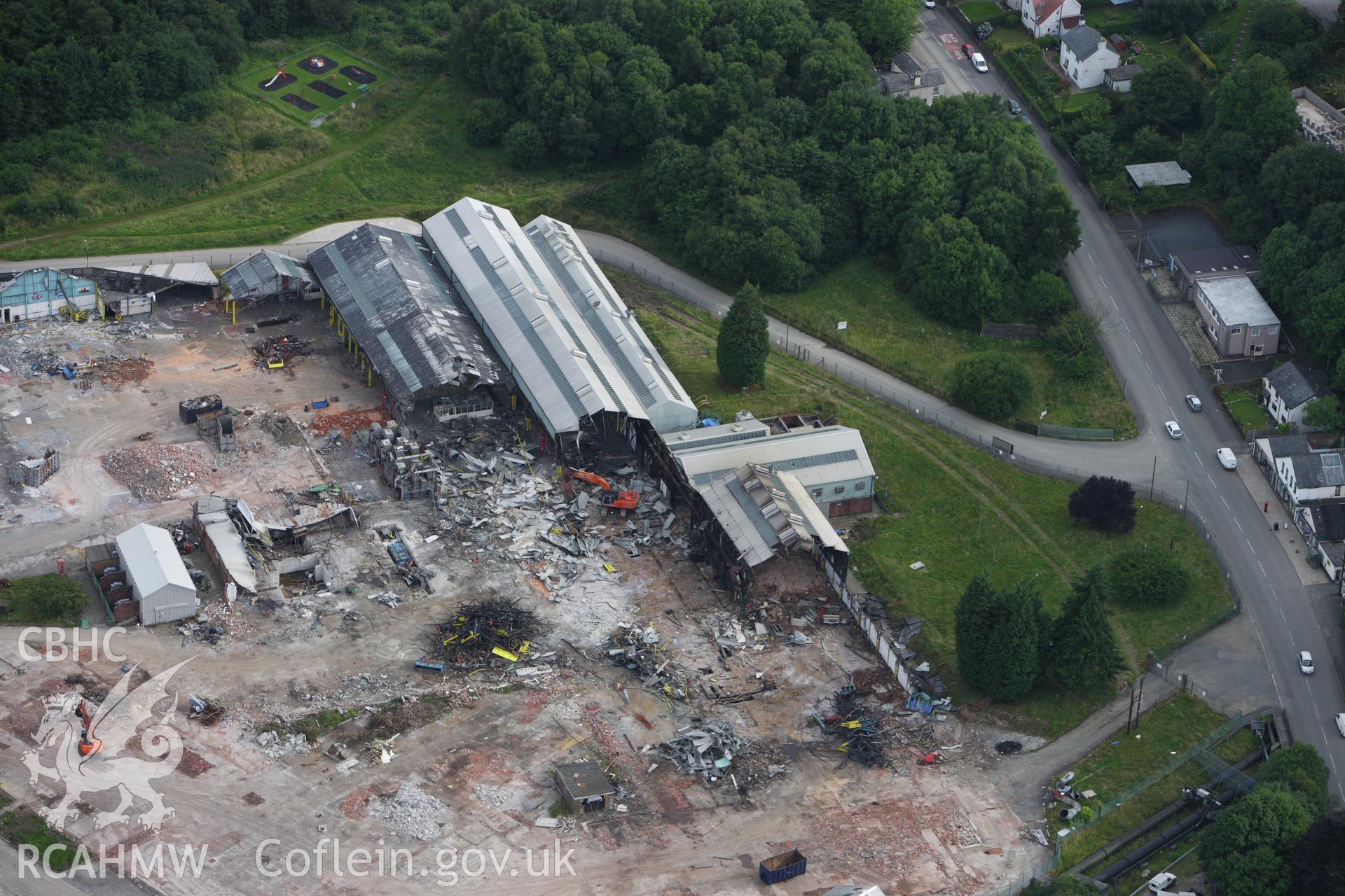 RCAHMW colour oblique aerial photograph of Dolgarrog Aluminium Works during demolition. Taken on 06 August 2009 by Toby Driver