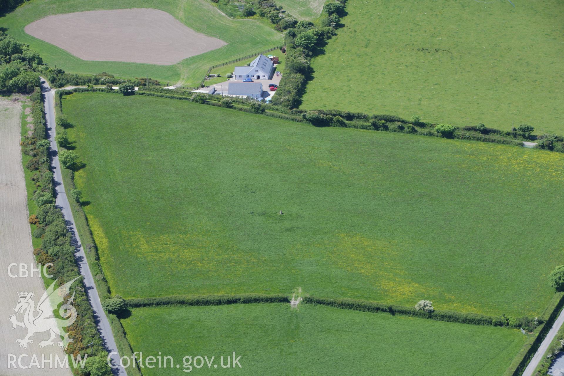 RCAHMW colour oblique aerial photograph of Corbalengi Stone. Taken on 01 June 2009 by Toby Driver