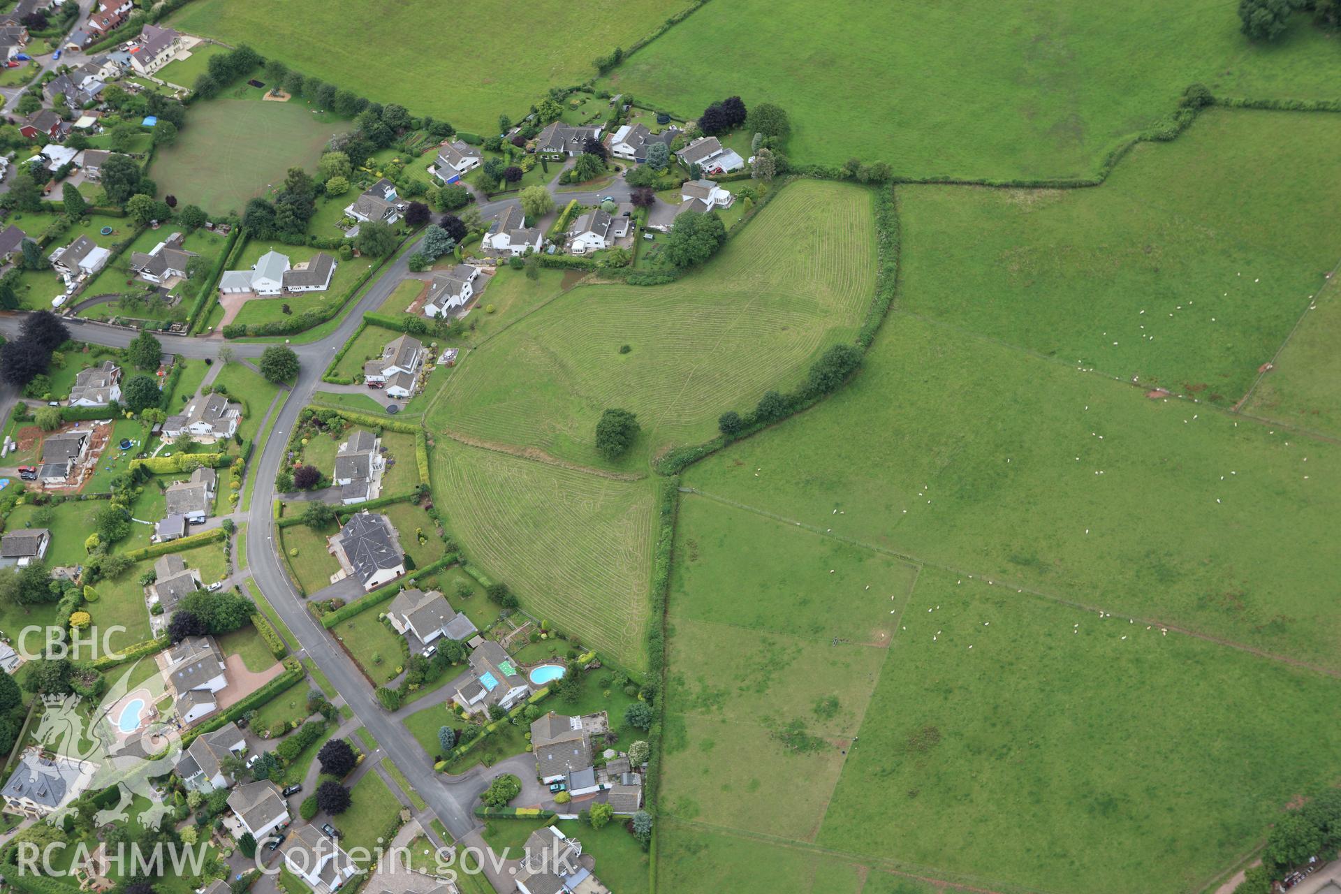 RCAHMW colour oblique aerial photograph of Llanvaches Castle. Taken on 09 July 2009 by Toby Driver