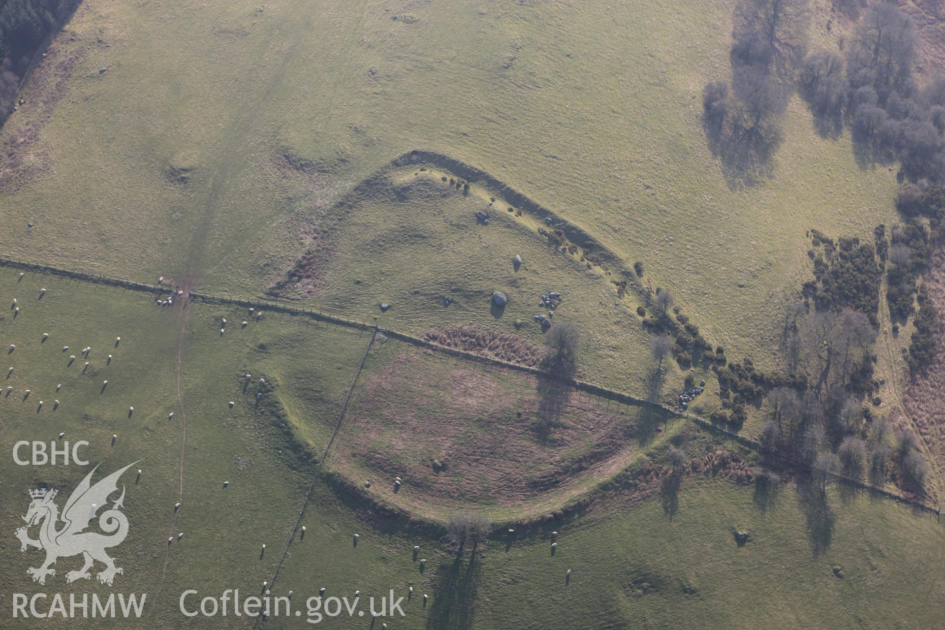 RCAHMW colour oblique photograph of Cefn Ddwysarn camp,. Taken by Toby Driver on 18/03/2009.