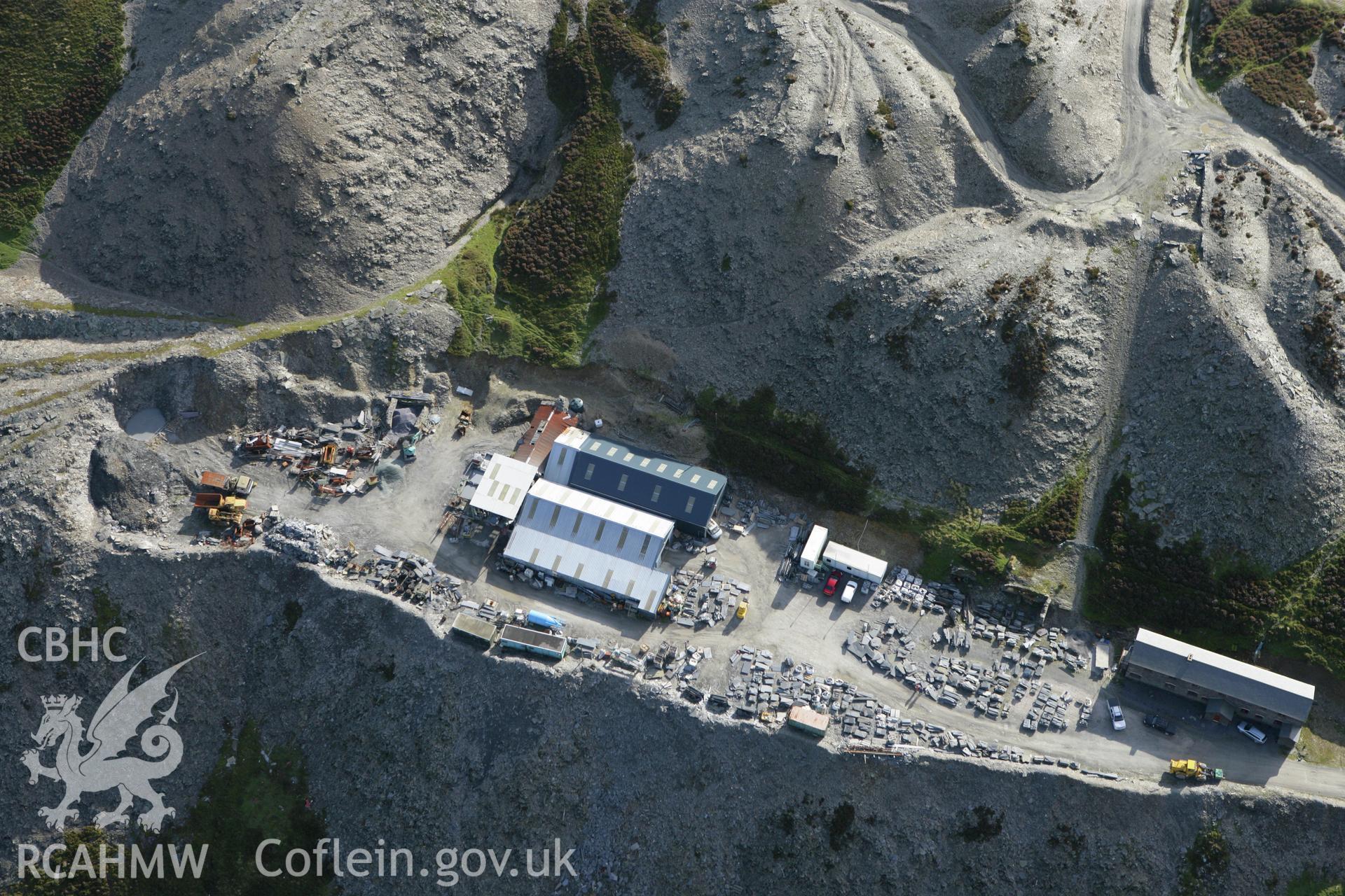 RCAHMW colour oblique aerial photograph of Clogau Quarry Cottages. Taken on 13 October 2009 by Toby Driver