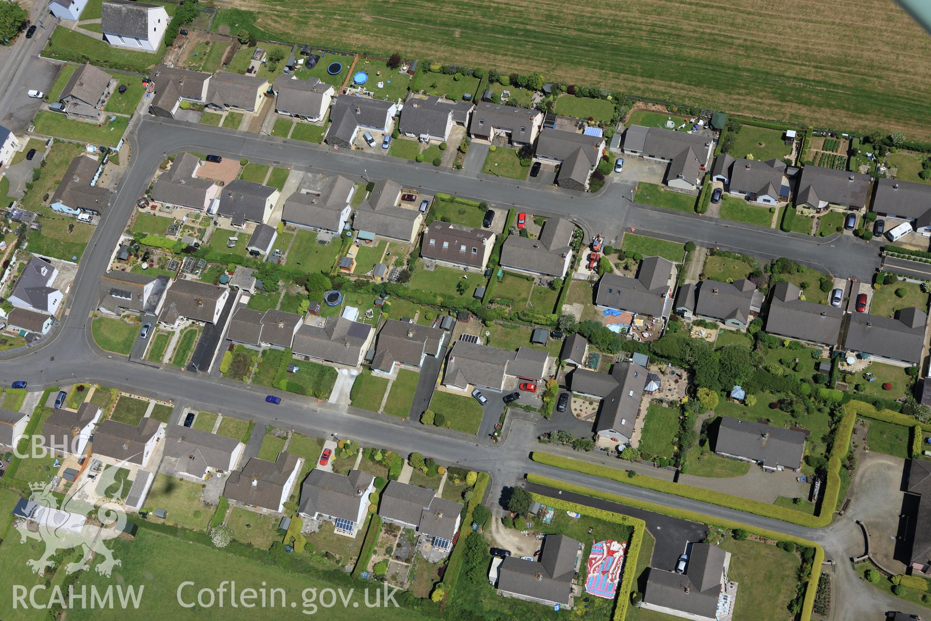 RCAHMW colour oblique aerial photograph of Letterston Housing Estate. Taken on 01 June 2009 by Toby Driver