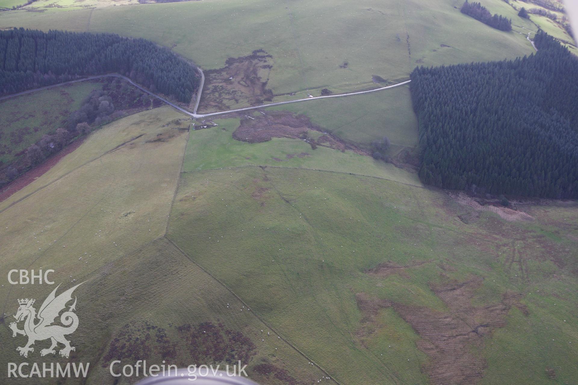 RCAHMW colour oblique aerial photograph of a section of the Monk's Trod from Abbey Cwm Hir to Park and Moel Hywel. Taken on 10 December 2009 by Toby Driver