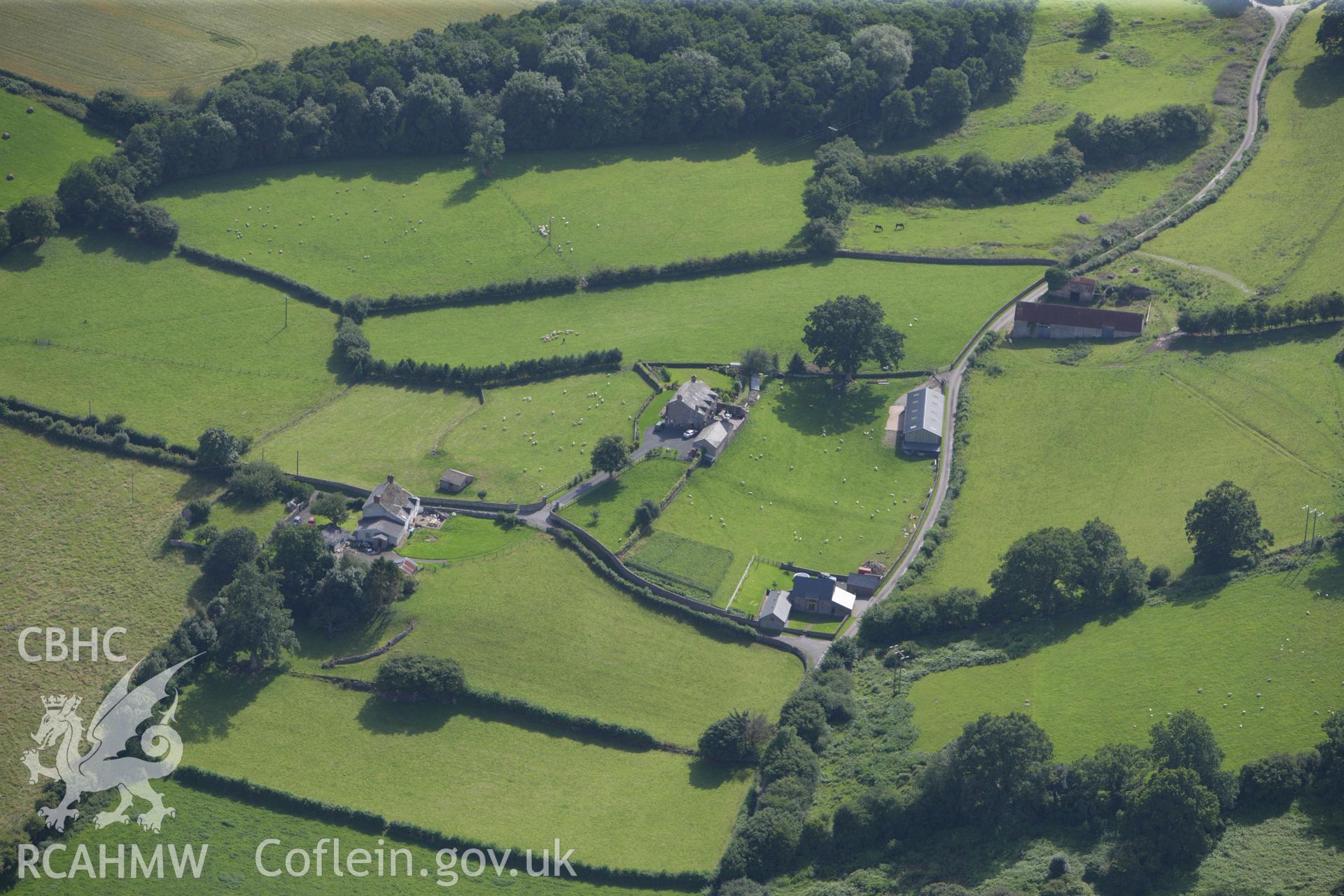 RCAHMW colour oblique aerial photograph of Castell Madoc Ringwork. Taken on 23 July 2009 by Toby Driver