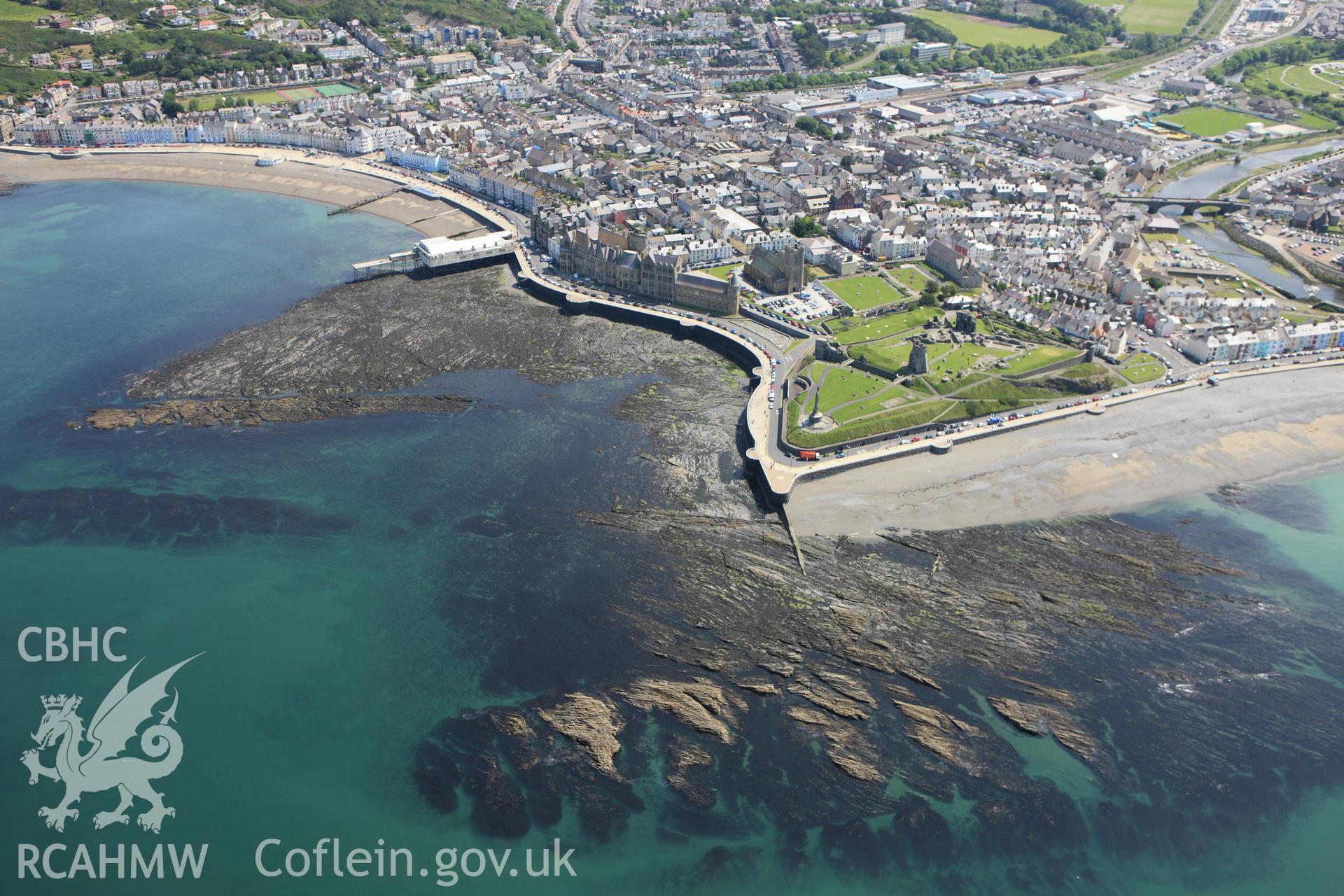 RCAHMW colour oblique aerial photograph of Aberystwyth and surrounding landscape. Taken on 02 June 2009 by Toby Driver