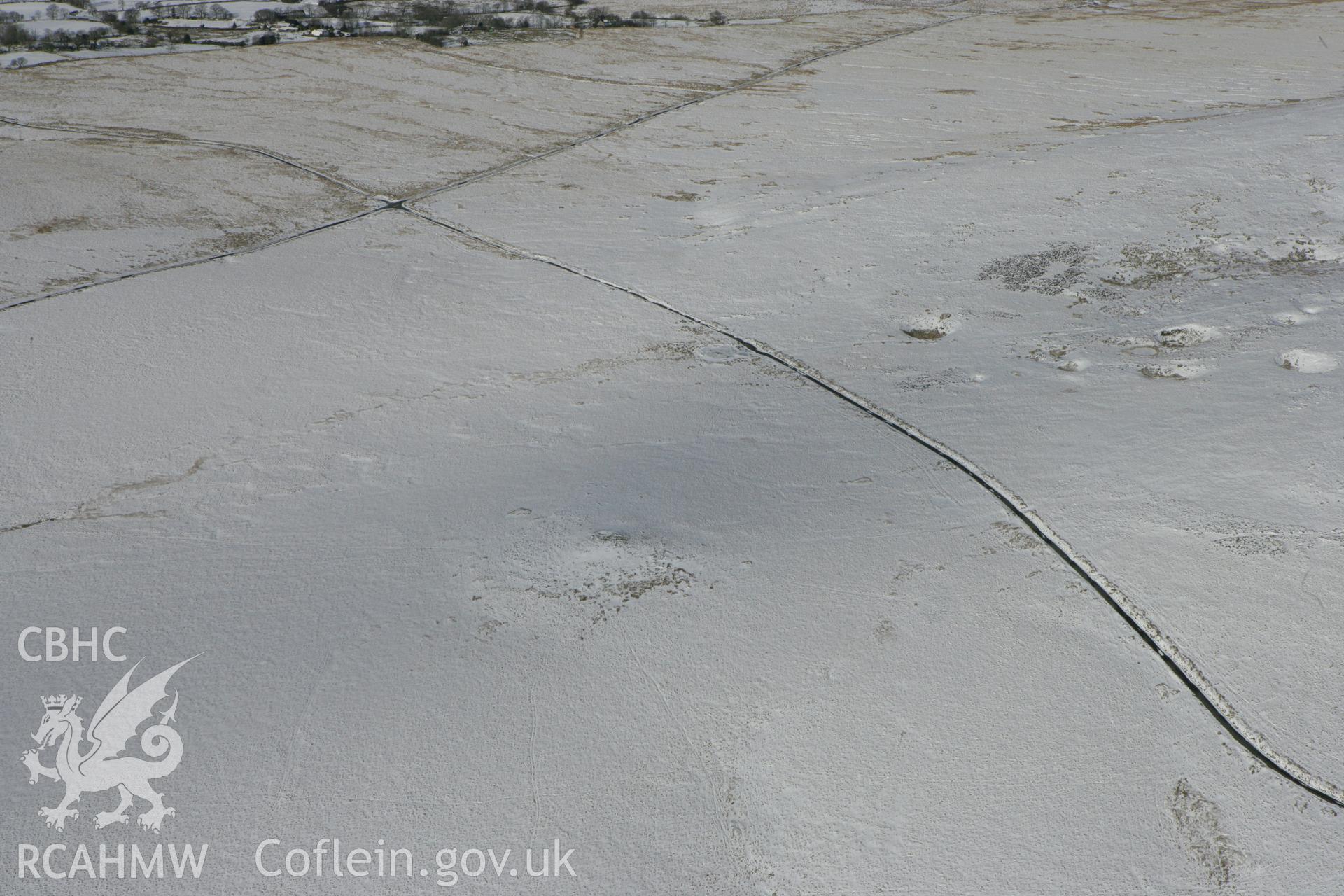 RCAHMW colour oblique photograph of Banc-Crucorfod round cairn. Taken by Toby Driver on 06/02/2009.