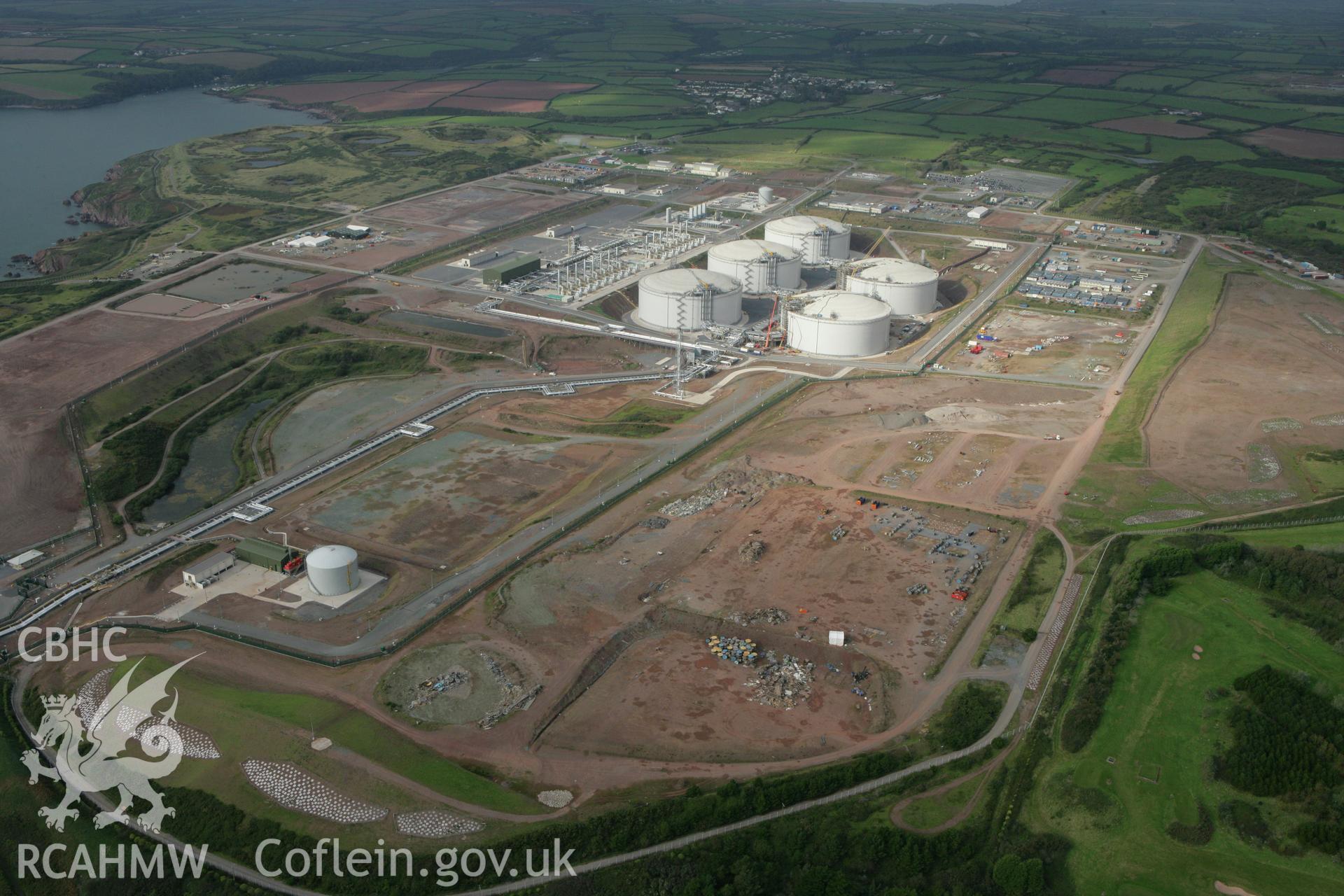 RCAHMW colour oblique aerial photograph of Esso South Hook Oil Refinery and liquid natural gas facility, Milford Haven. Taken on 14 October 2009 by Toby Driver