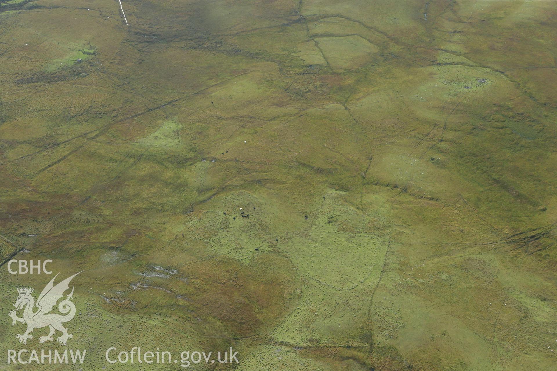 RCAHMW colour oblique aerial photograph of Craig Derlwyn Enclosure. Taken on 14 October 2009 by Toby Driver